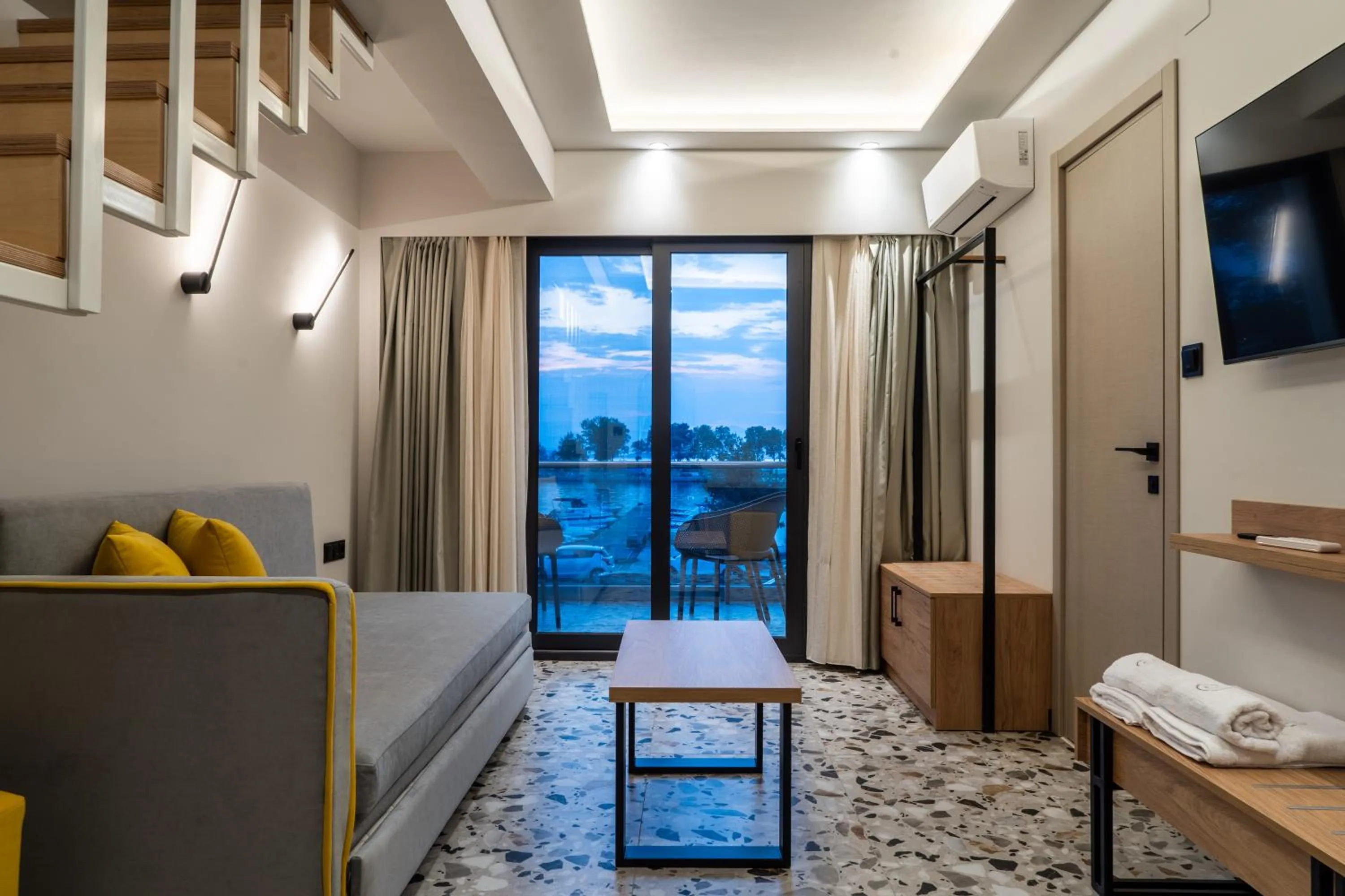 Bed in NERO SEASCAPE SUITES