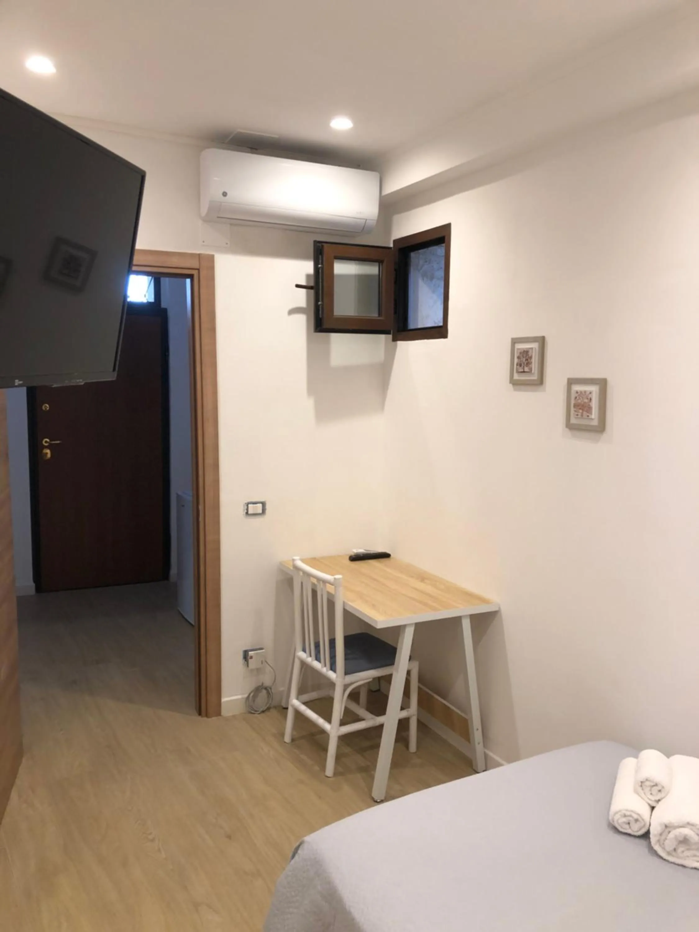 Photo of the whole room, TV/Entertainment Center in Ca’del Borgo B&B Country House