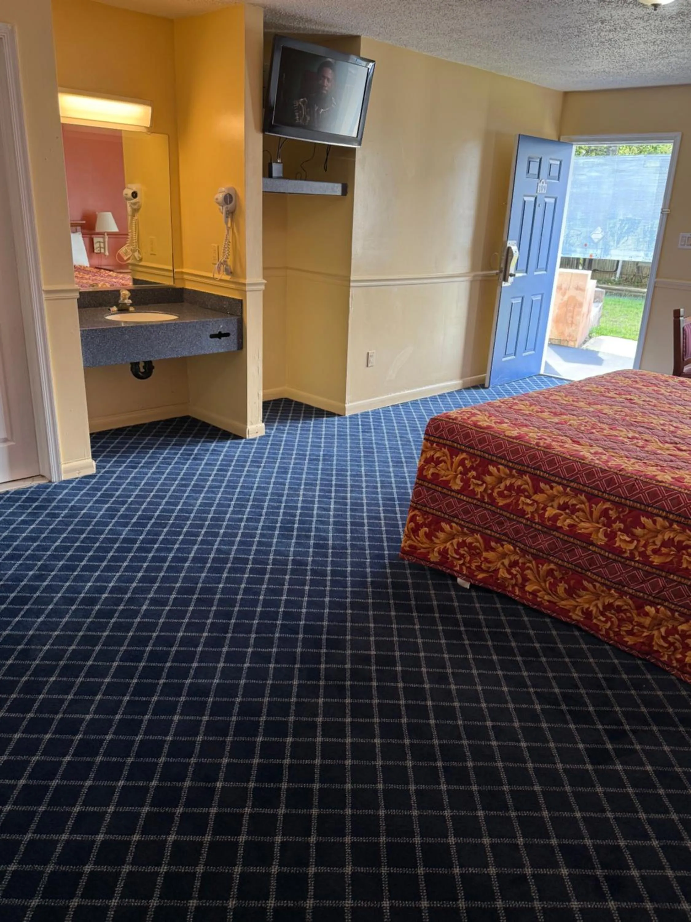 Bed in American Star Inn & Suites Atlantic City