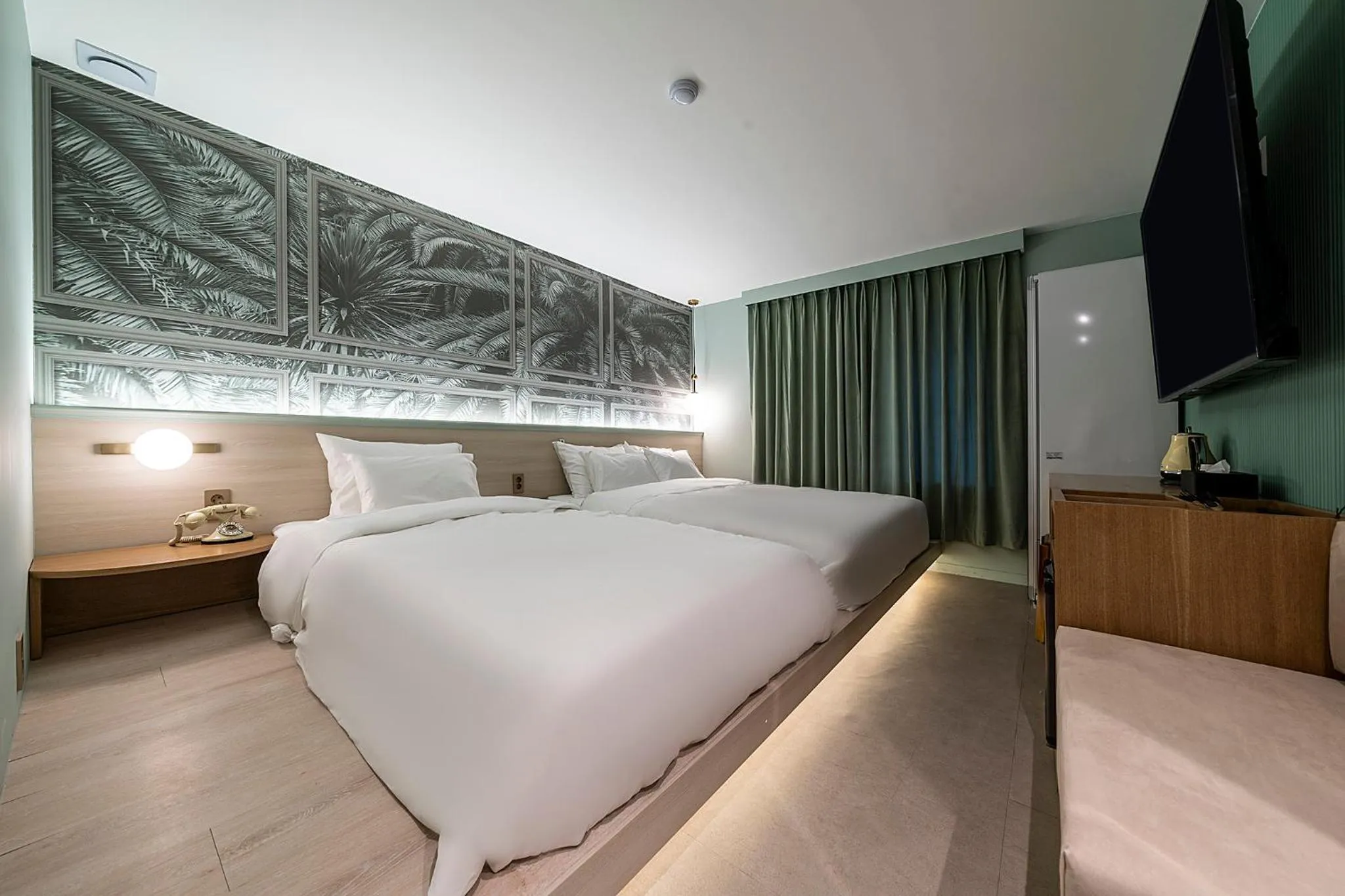 Bed in Wonju Hotel Ippda