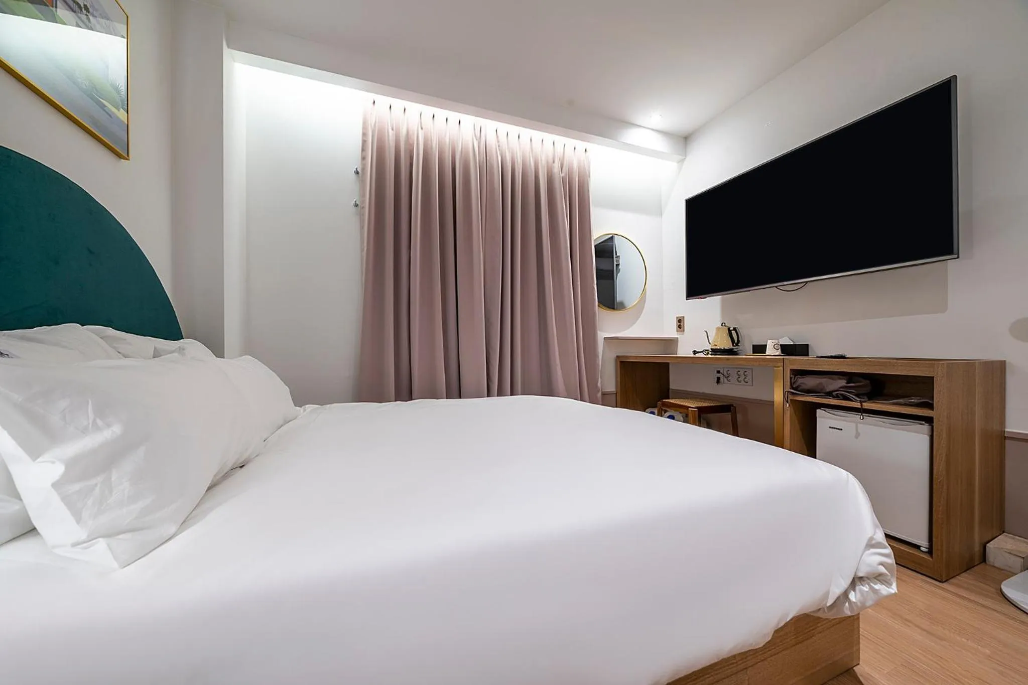 Bed in Wonju Hotel Ippda