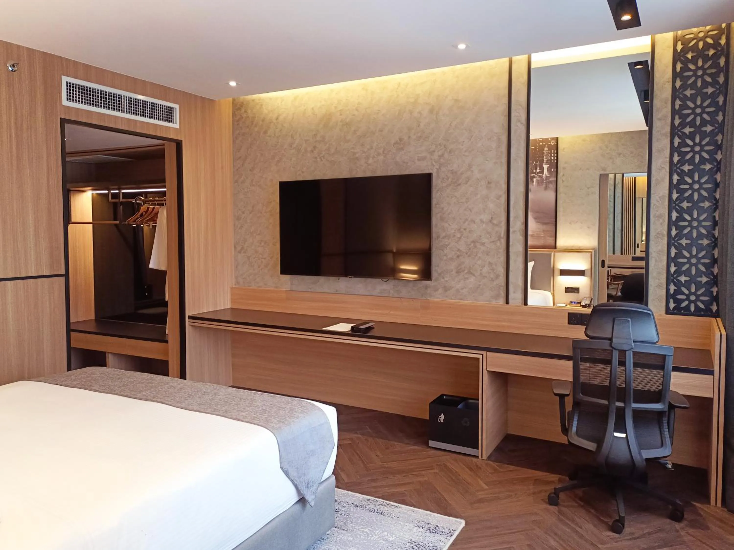 Bed in Hotel Royal Signature