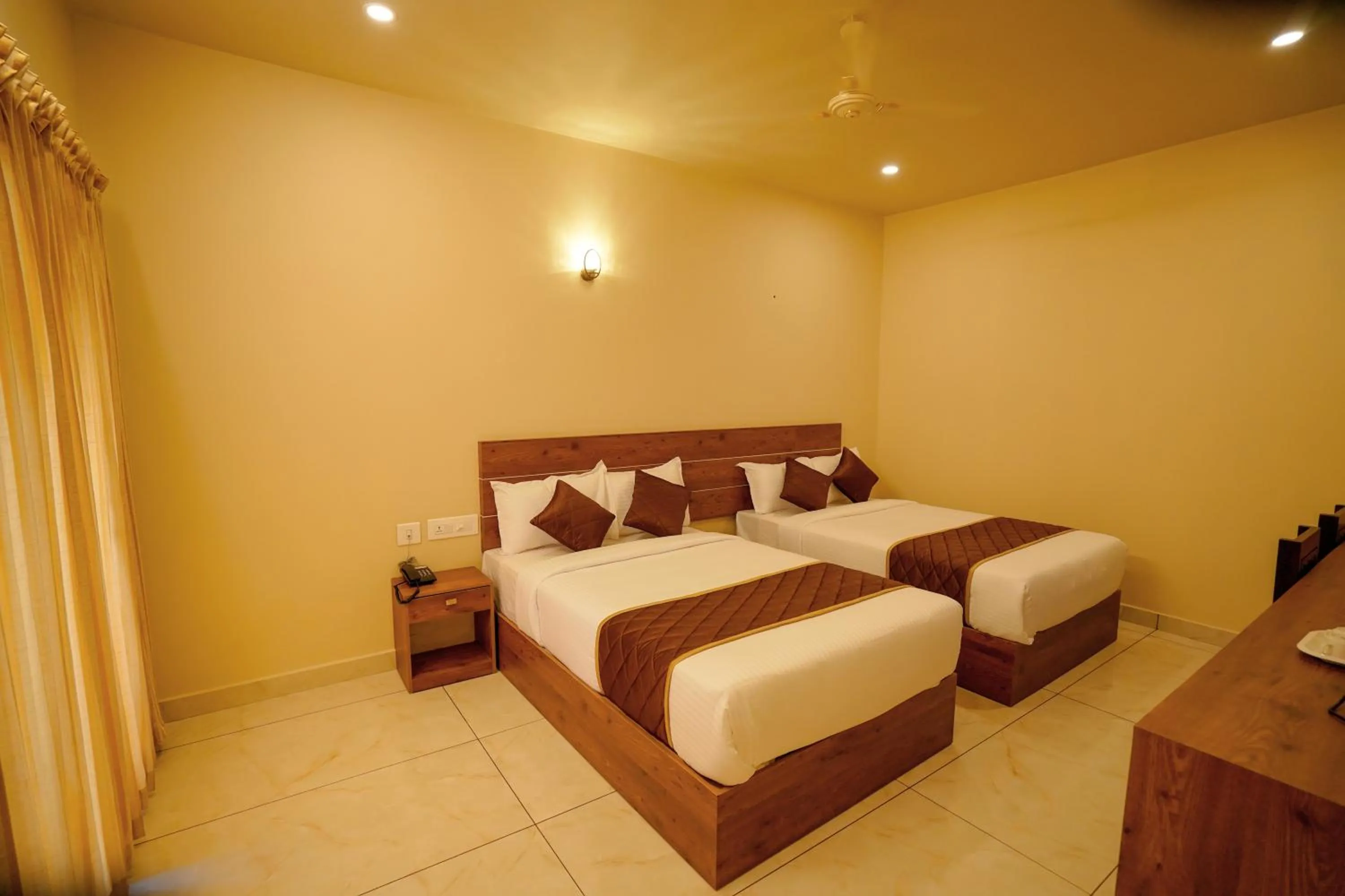 Bed in KOTTACKAL NATURE INN