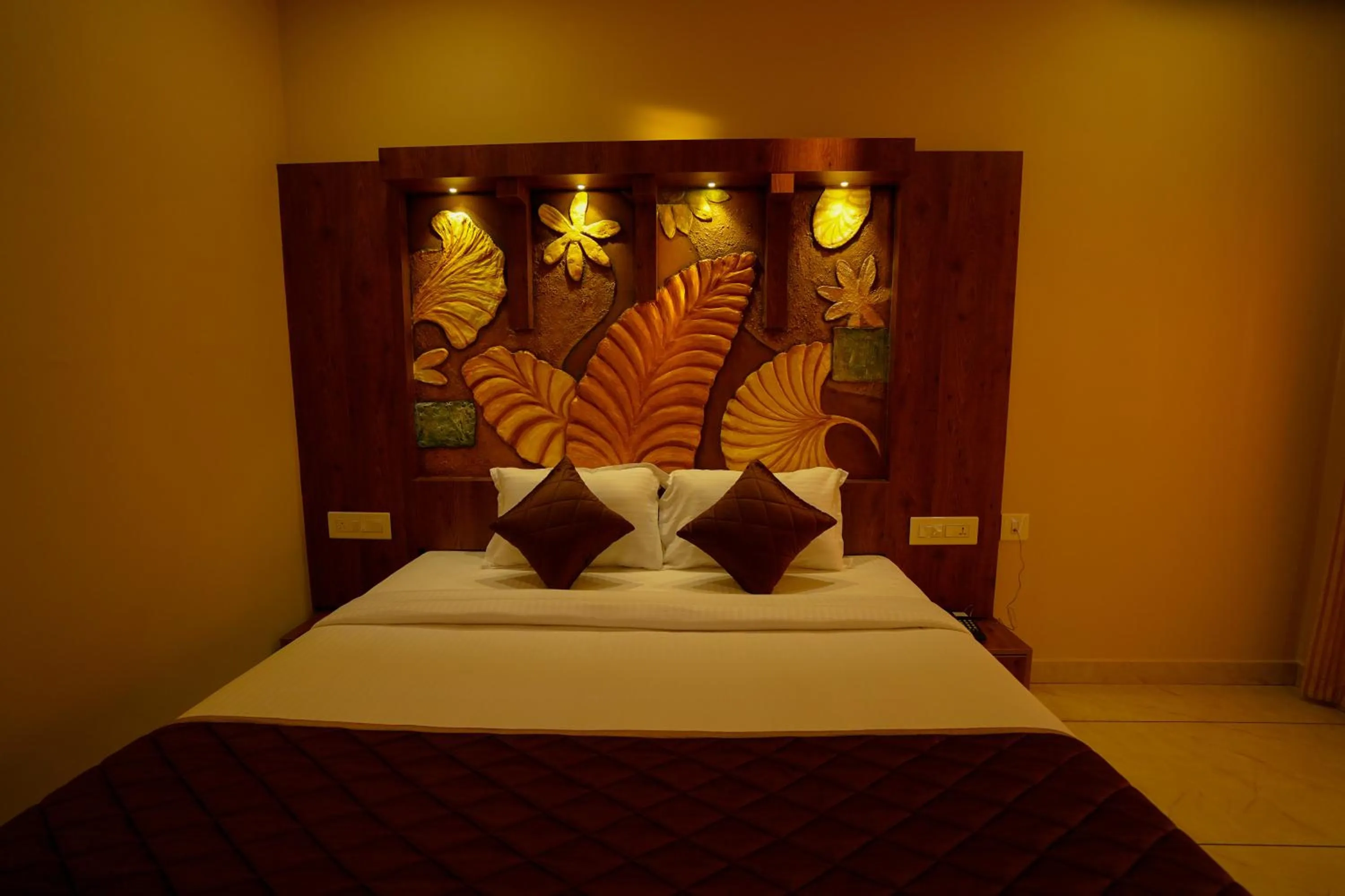 Bed in KOTTACKAL NATURE INN