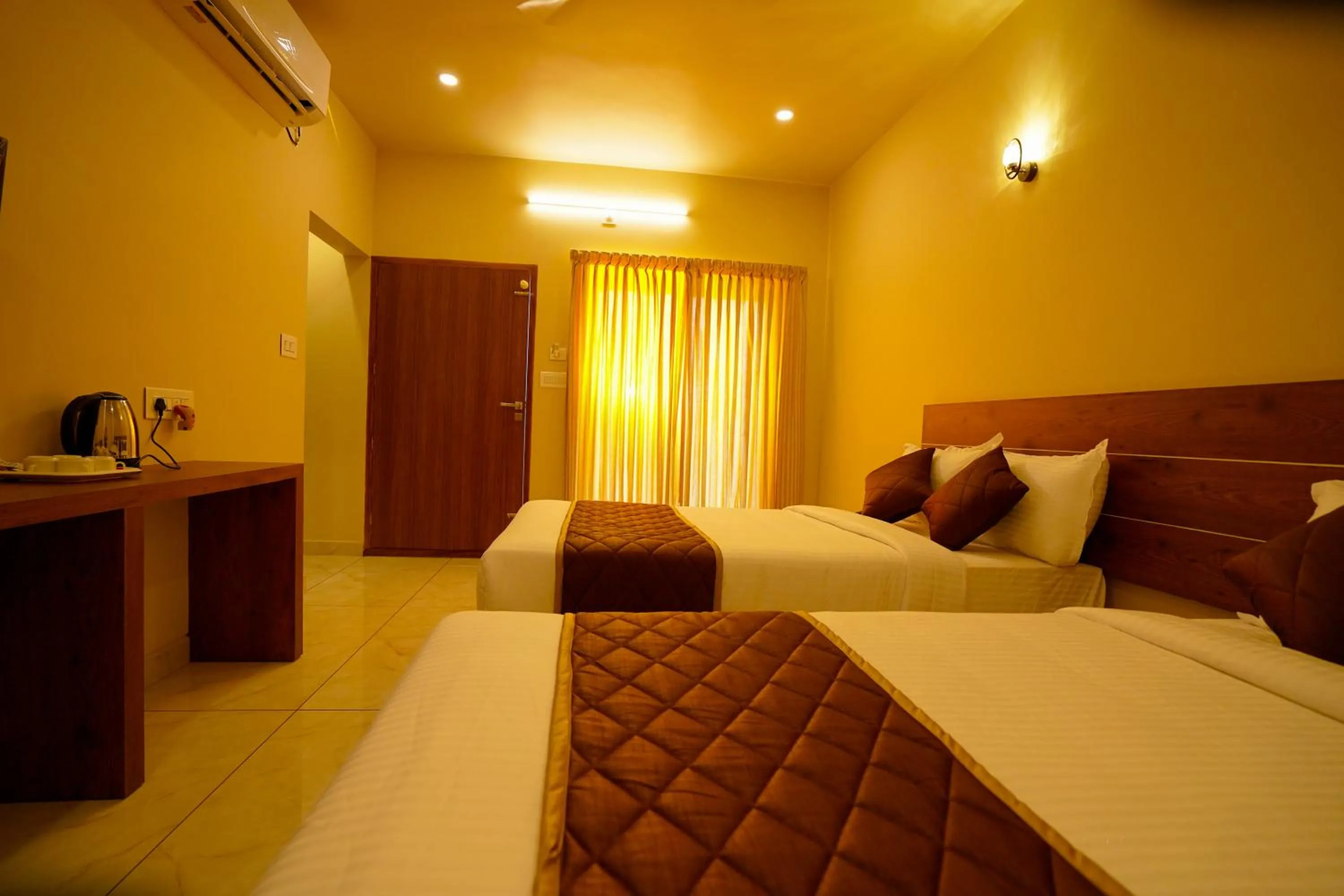 Bed in KOTTACKAL NATURE INN