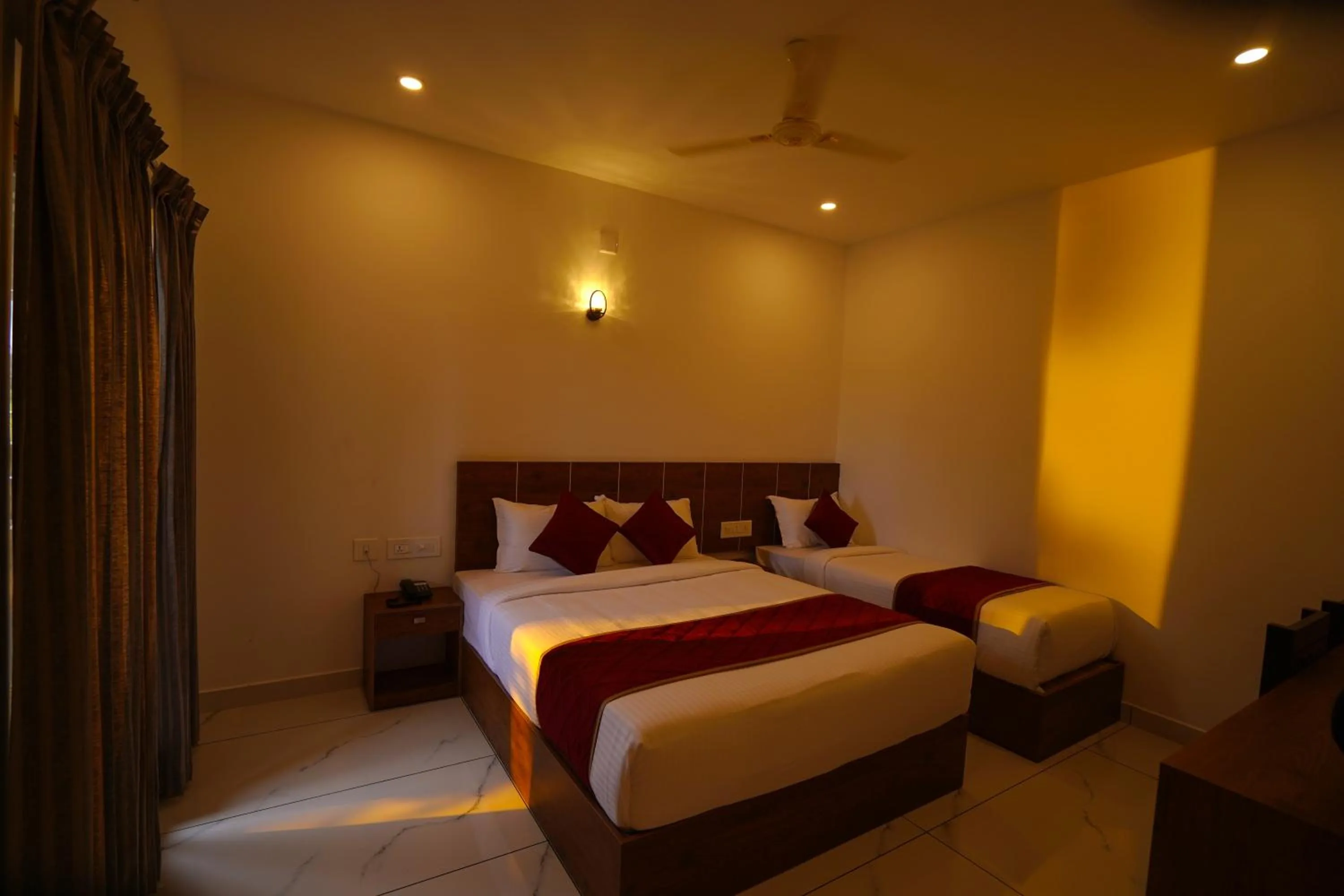 Bed in KOTTACKAL NATURE INN