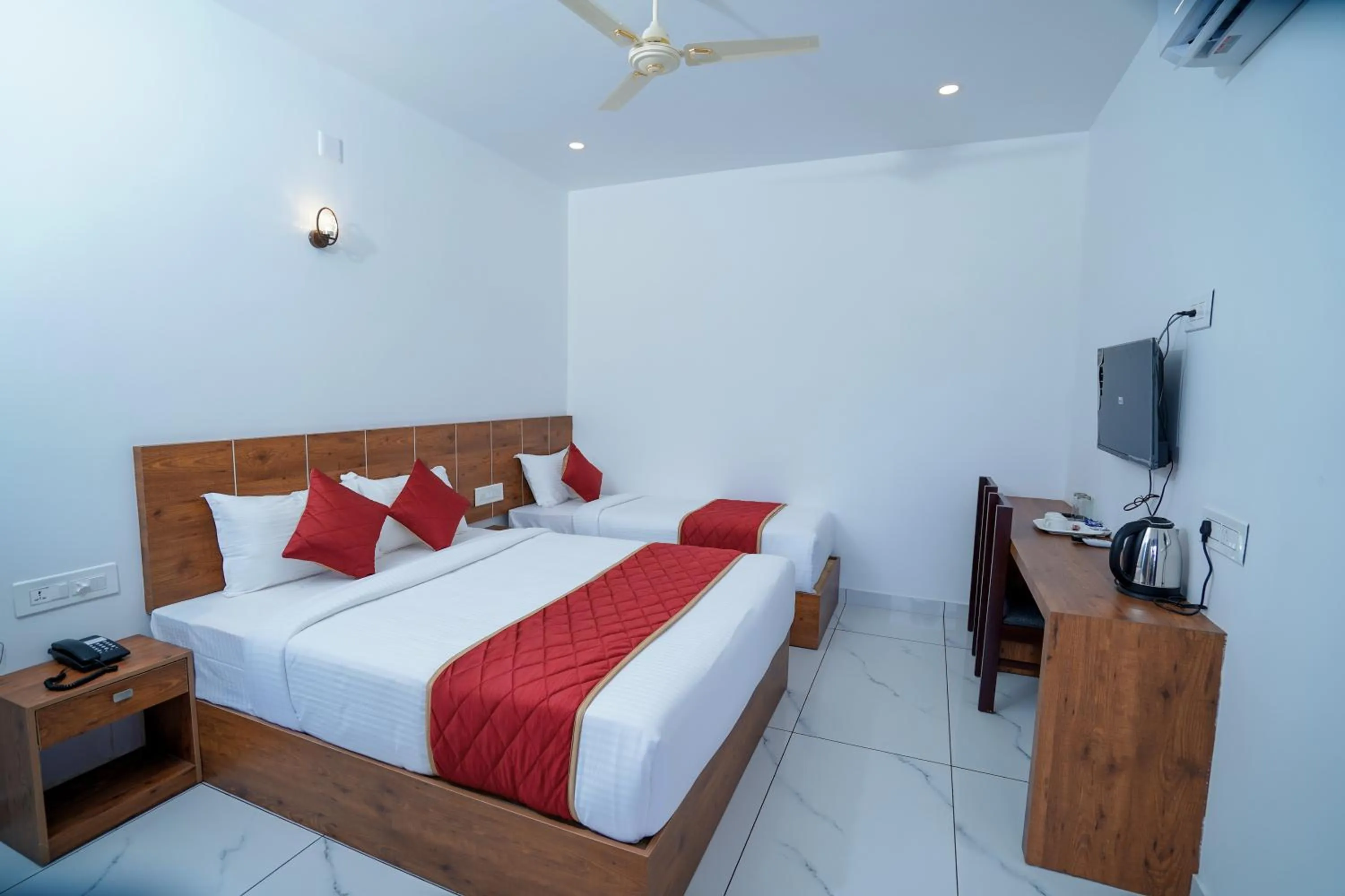 Bed in KOTTACKAL NATURE INN