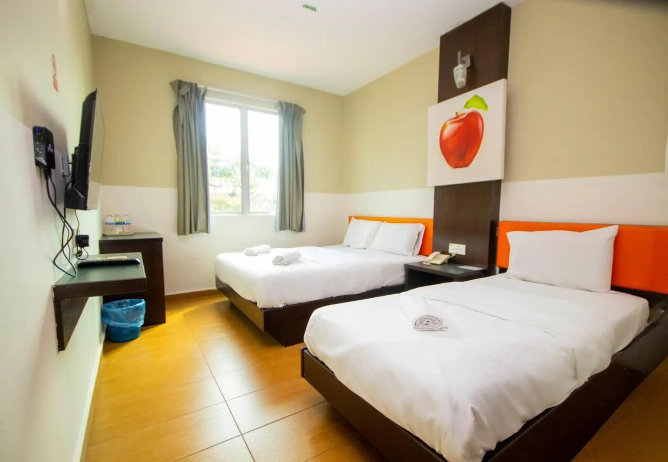 Bed in JQ Suria Hotel