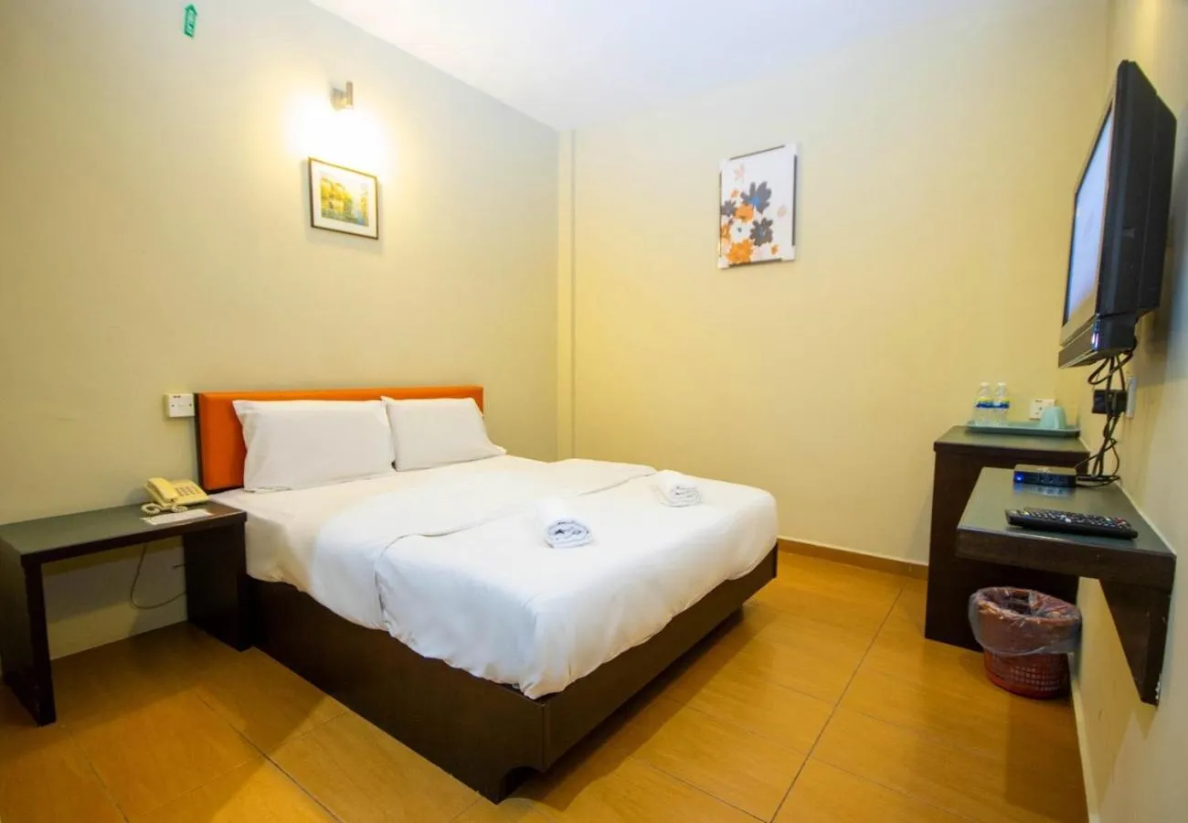 Bed in JQ Suria Hotel