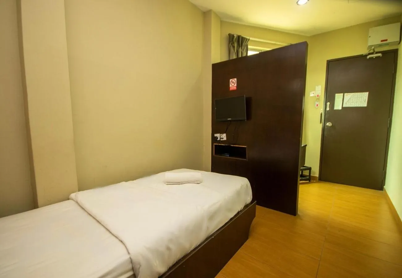 Bed in JQ Suria Hotel