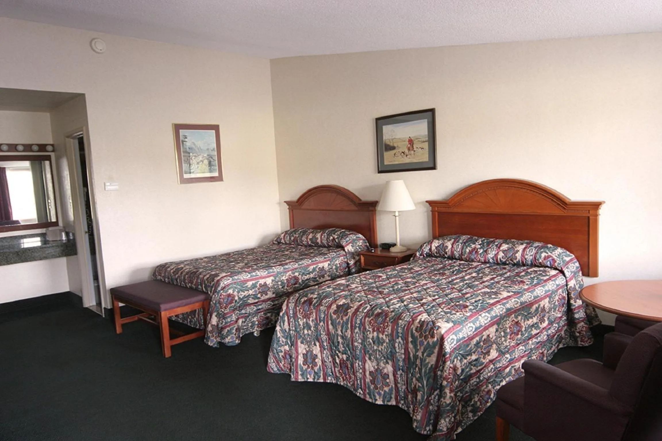 Bed in Landmark Motor Inn