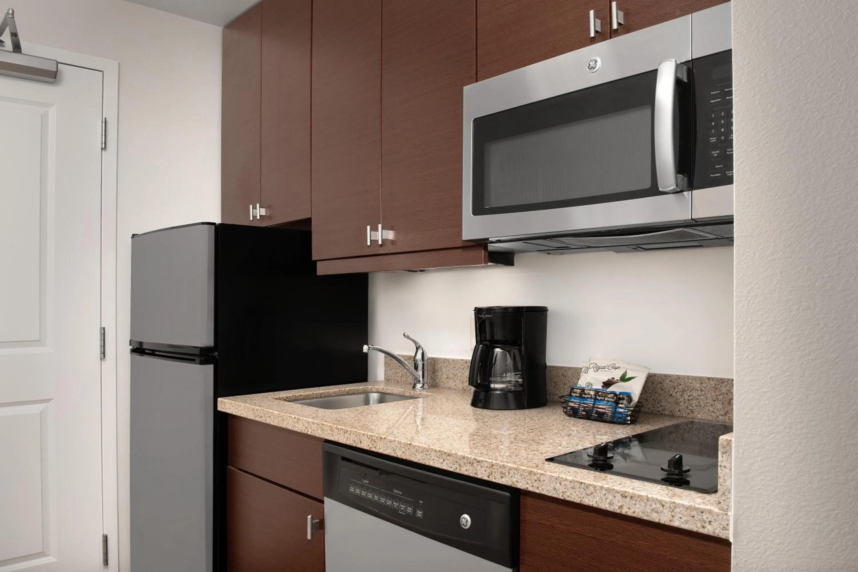 kitchen in TownePlace Suites by Marriott Cheyenne Southwest/Downtown Area