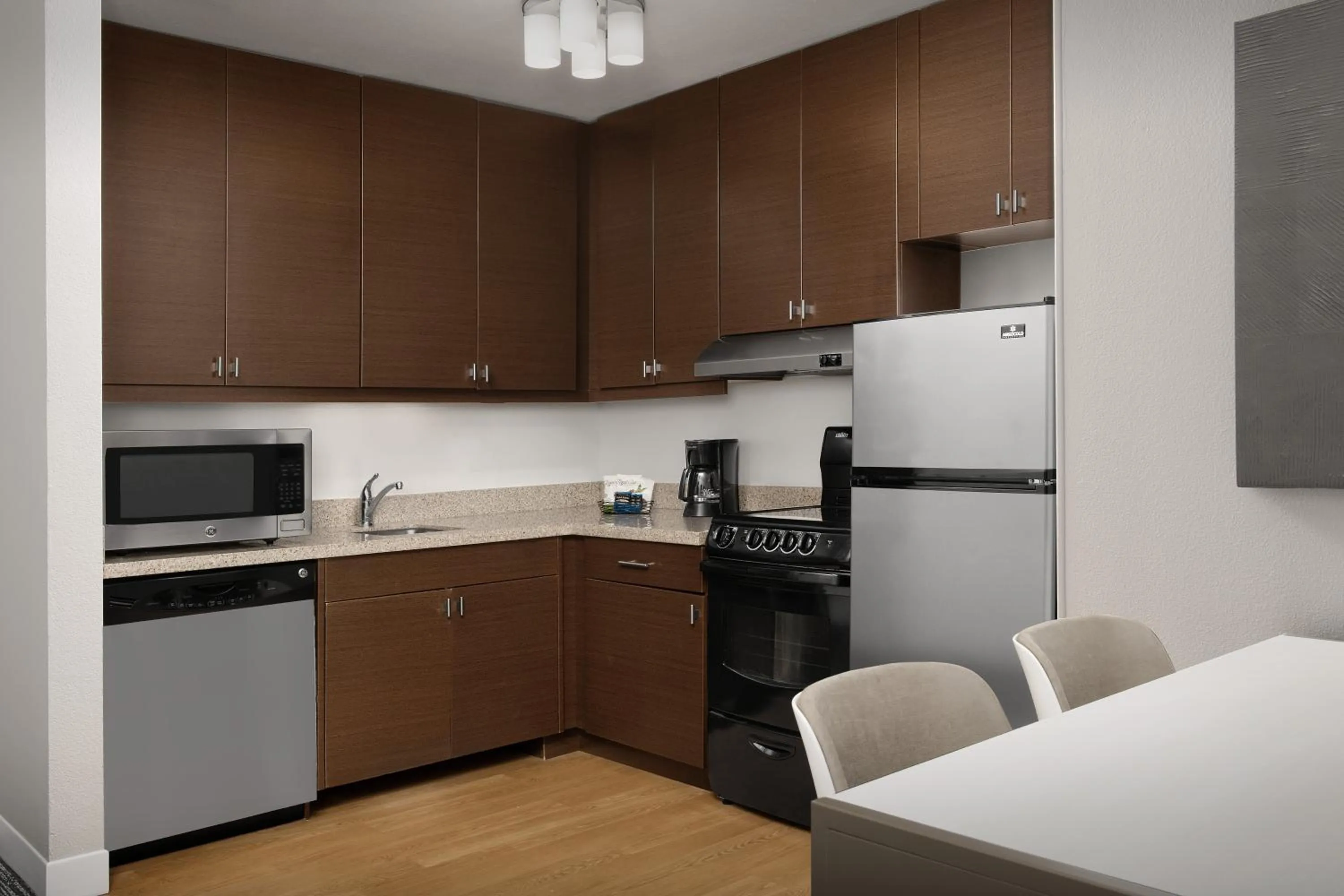 kitchen in TownePlace Suites by Marriott Cheyenne Southwest/Downtown Area