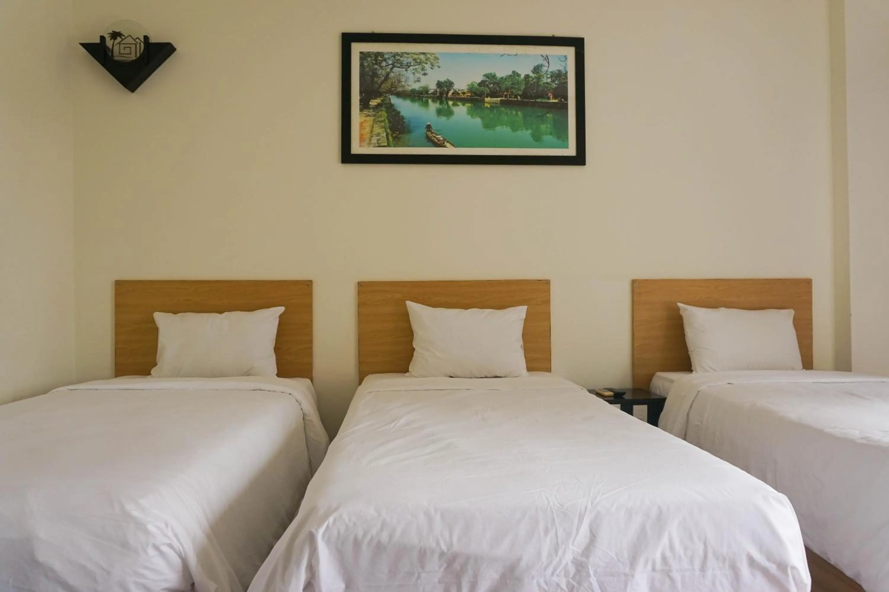 Living room, Bed in Paradise Hotel Hoi An