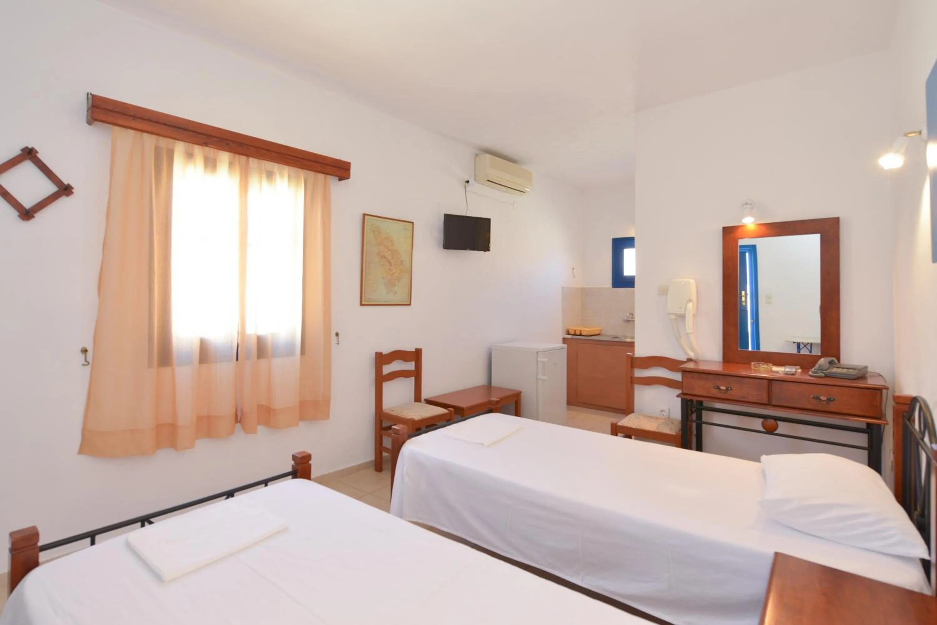 Photo of the whole room, Bed in Windmill Villas