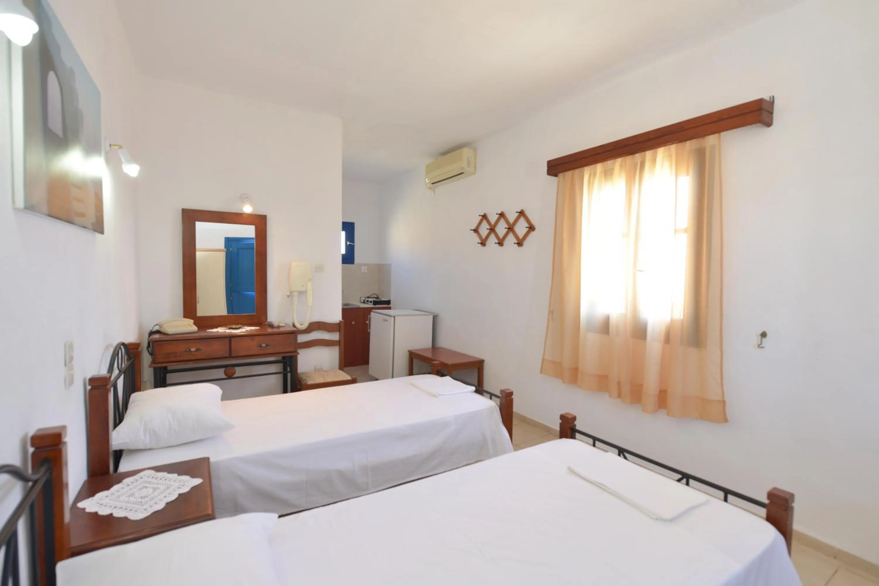 Photo of the whole room, Bed in Windmill Villas