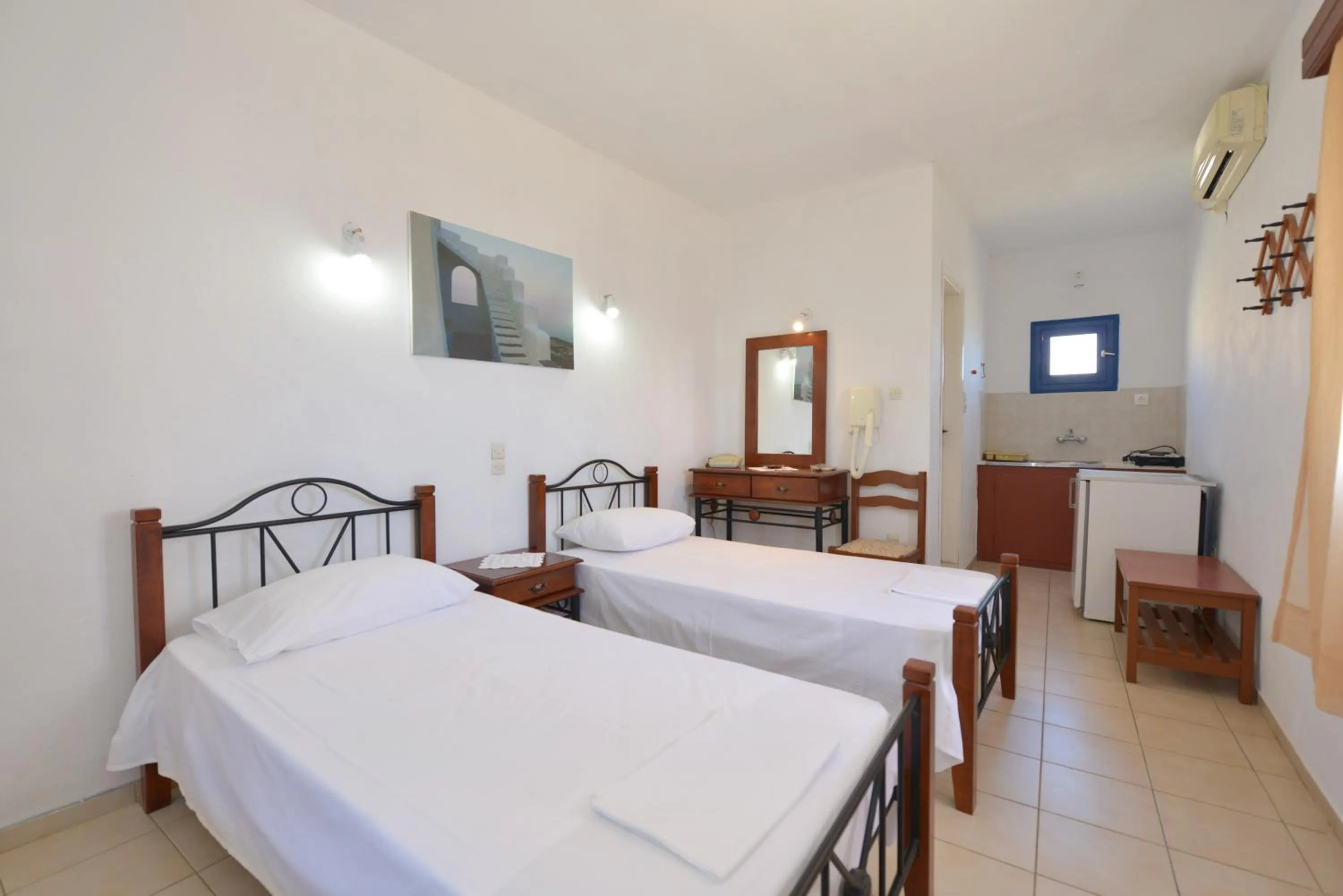 Photo of the whole room, Bed in Windmill Villas