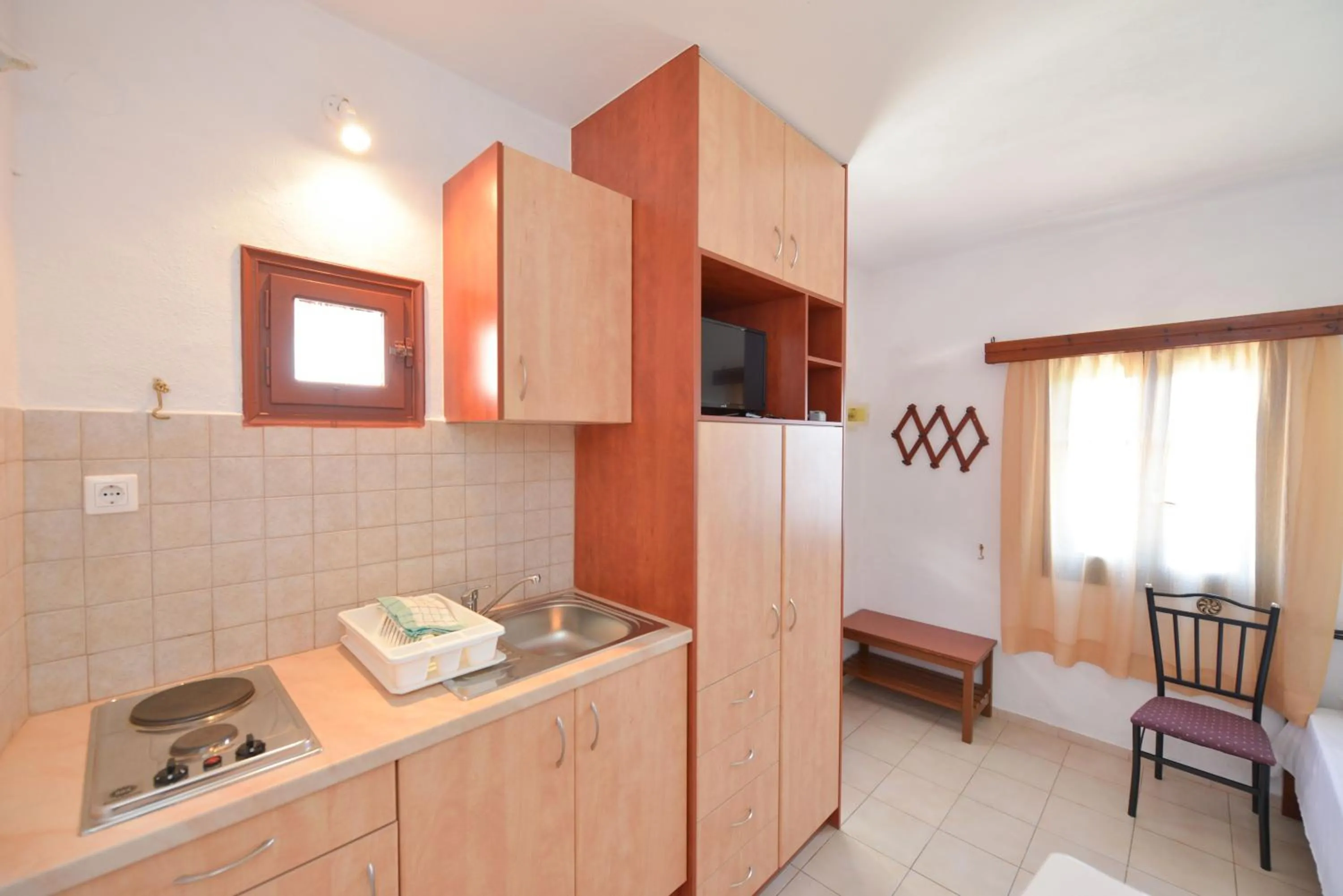 Kitchen or kitchenette in Windmill Villas