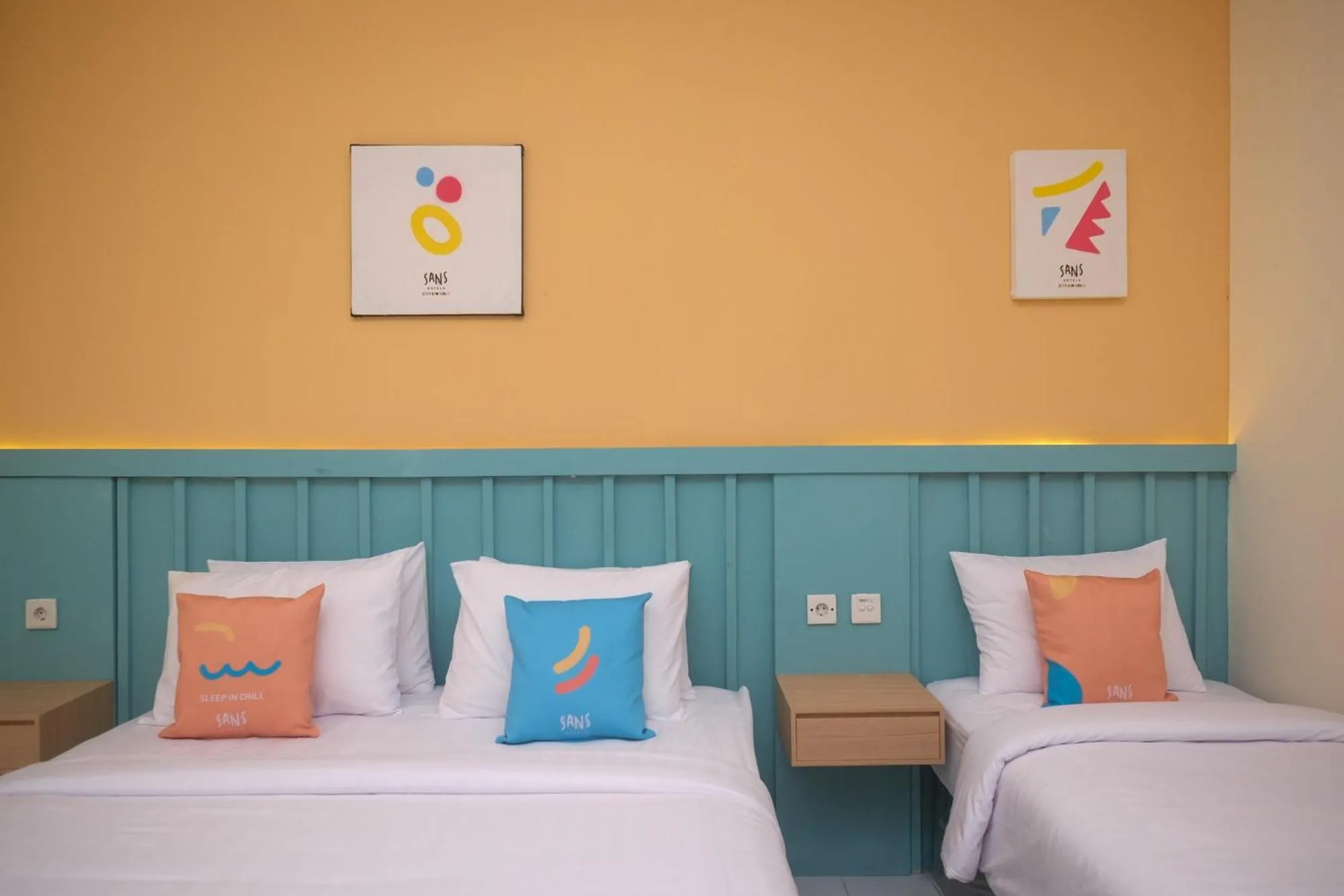 Bed in Sans Hotel City Inn Solo by RedDoorz