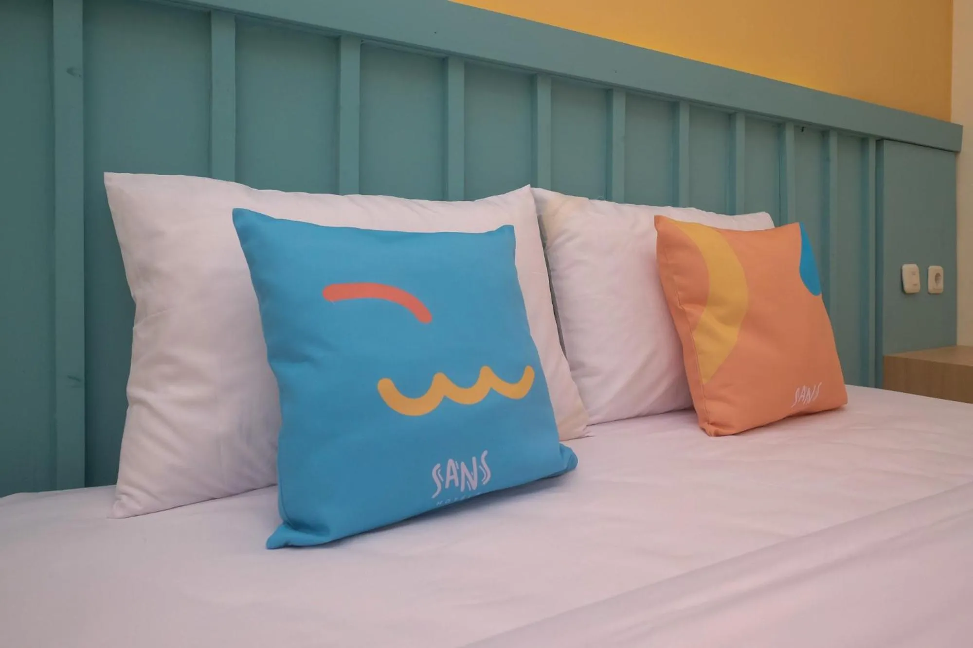 Bed in Sans Hotel City Inn Solo by RedDoorz