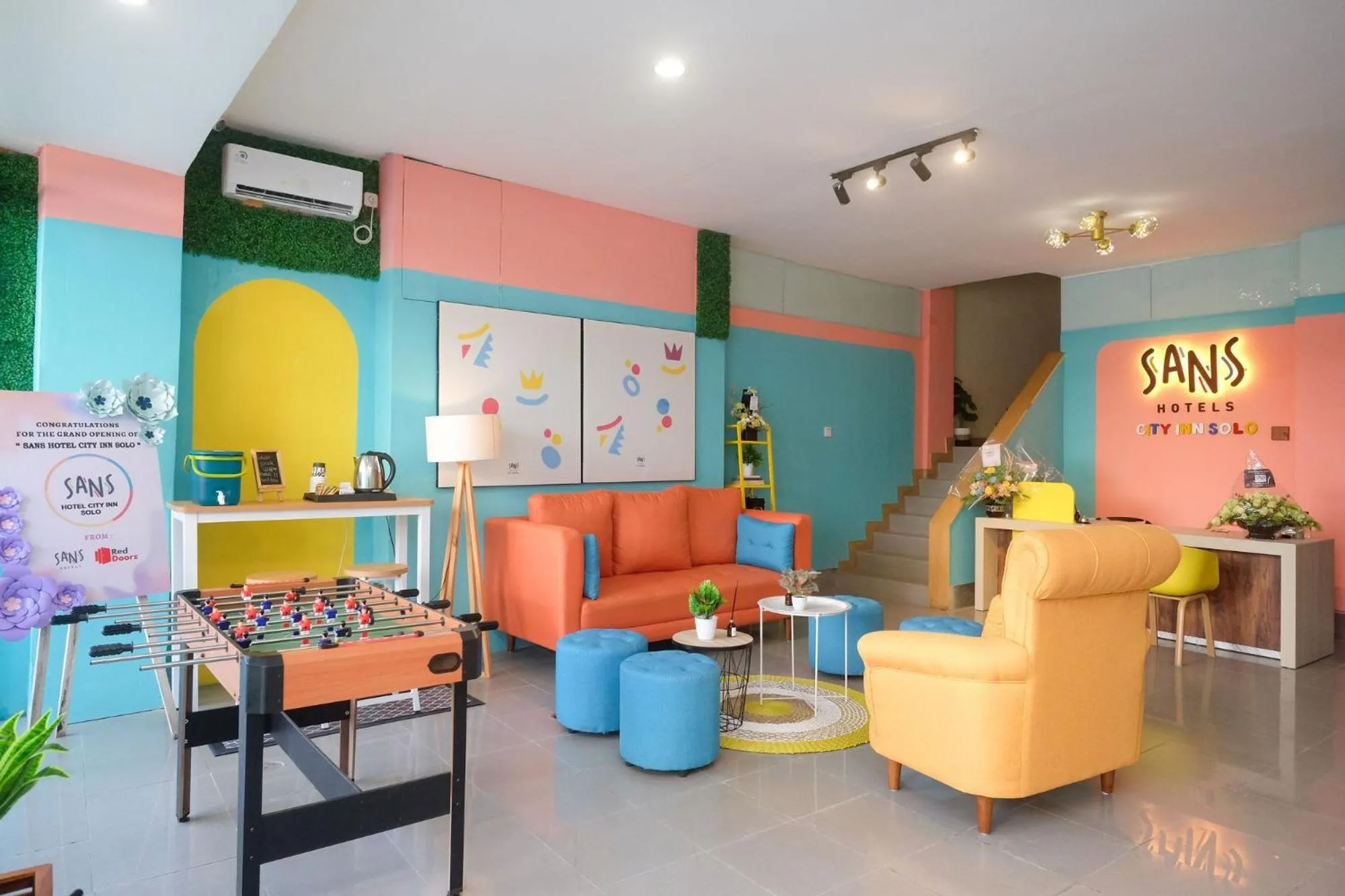 Lobby or reception in Sans Hotel City Inn Solo by RedDoorz