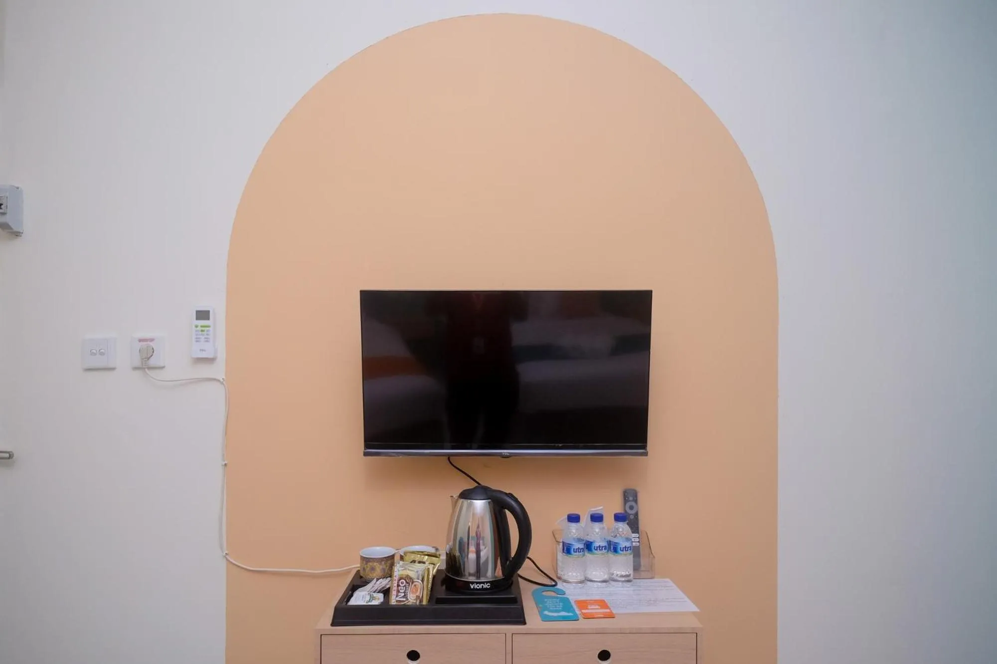 TV and multimedia in Sans Hotel City Inn Solo by RedDoorz