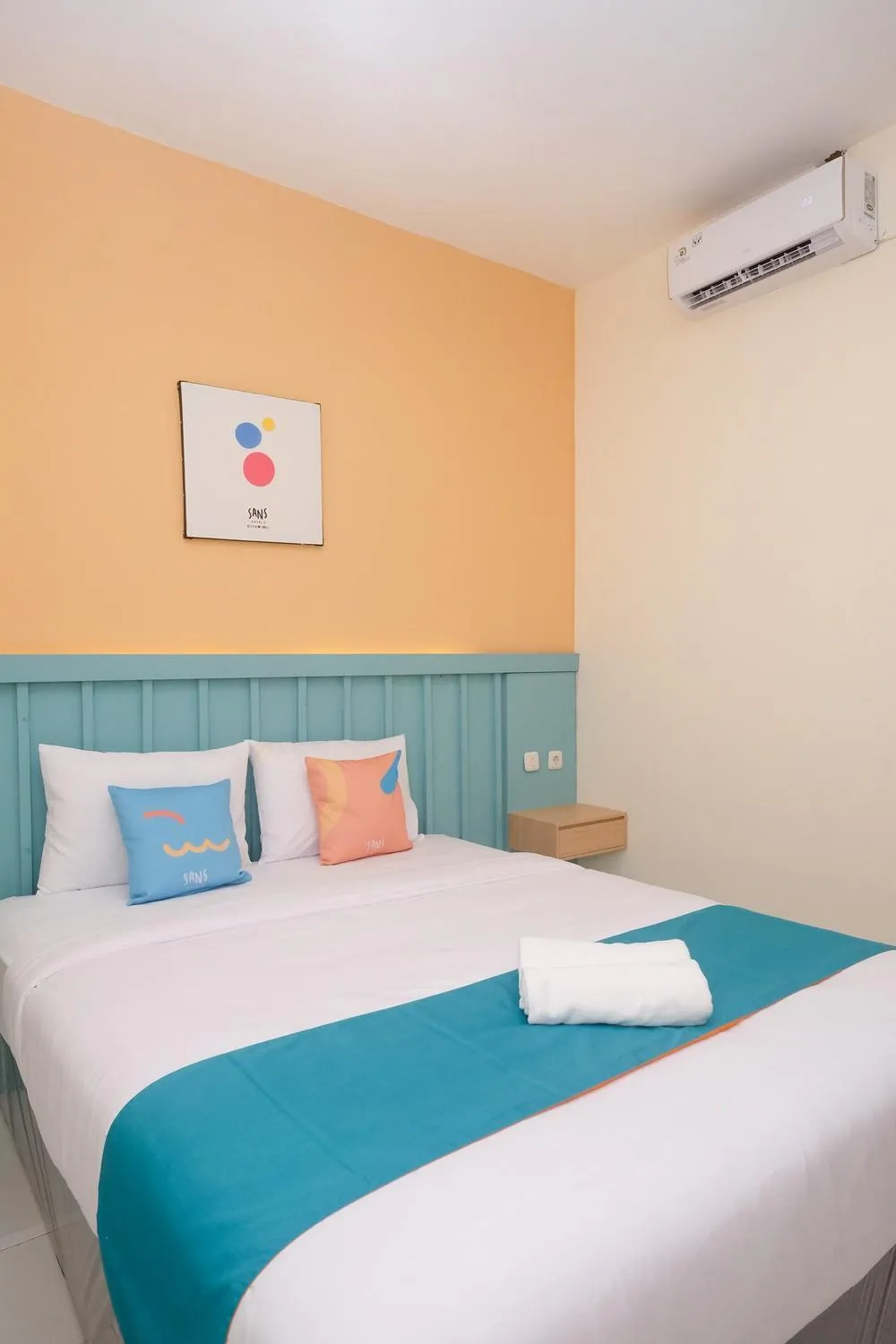 Bed in Sans Hotel City Inn Solo by RedDoorz