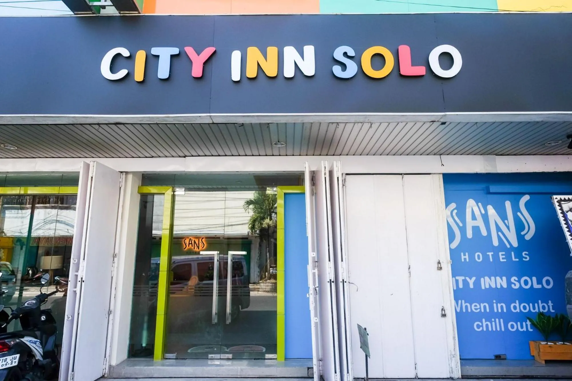 Property logo or sign in Sans Hotel City Inn Solo by RedDoorz