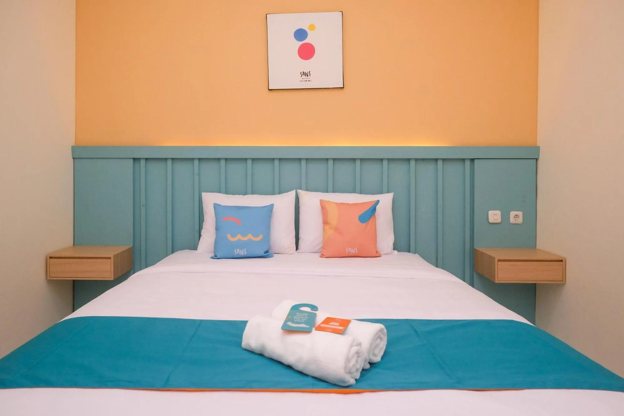 Bed in Sans Hotel City Inn Solo by RedDoorz