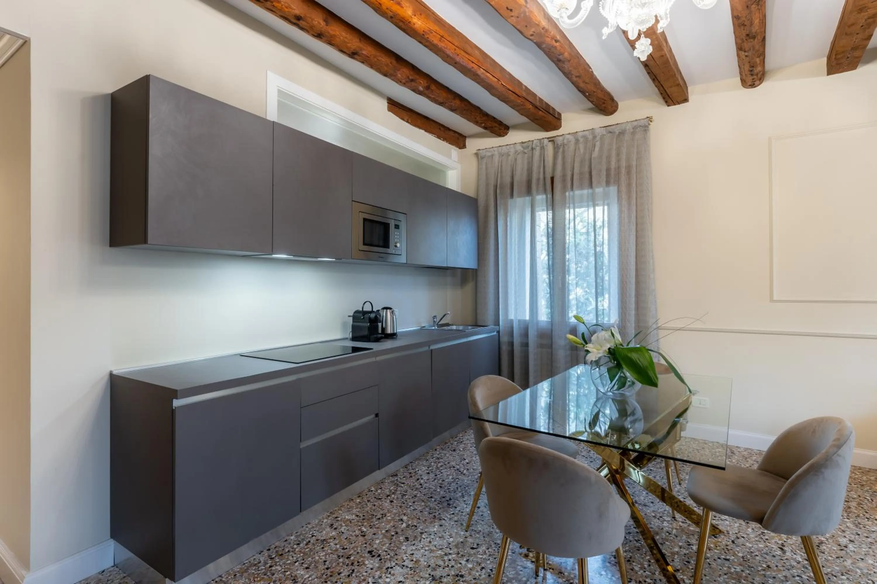 kitchen in San Vio Palace Luxury Apartments