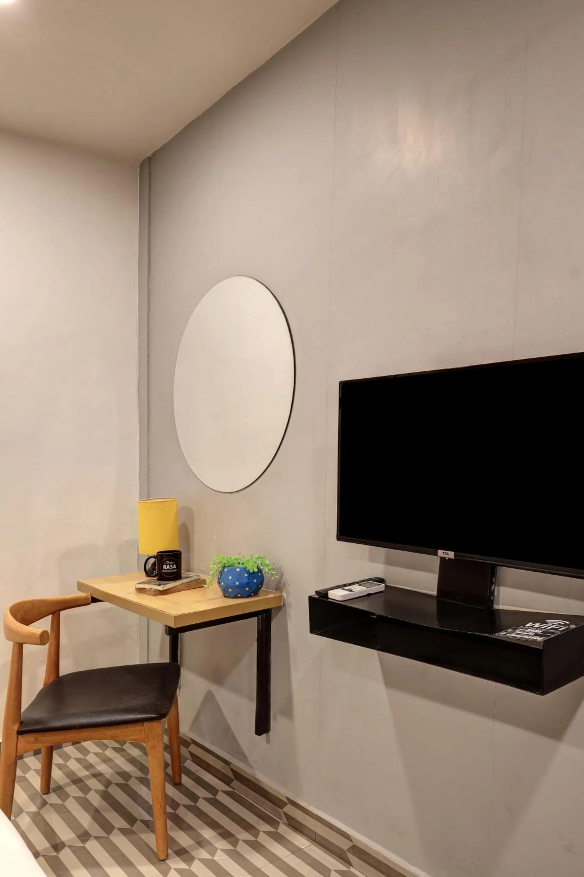 TV and multimedia in Hotel The Rasa Near Welcome Metro Station