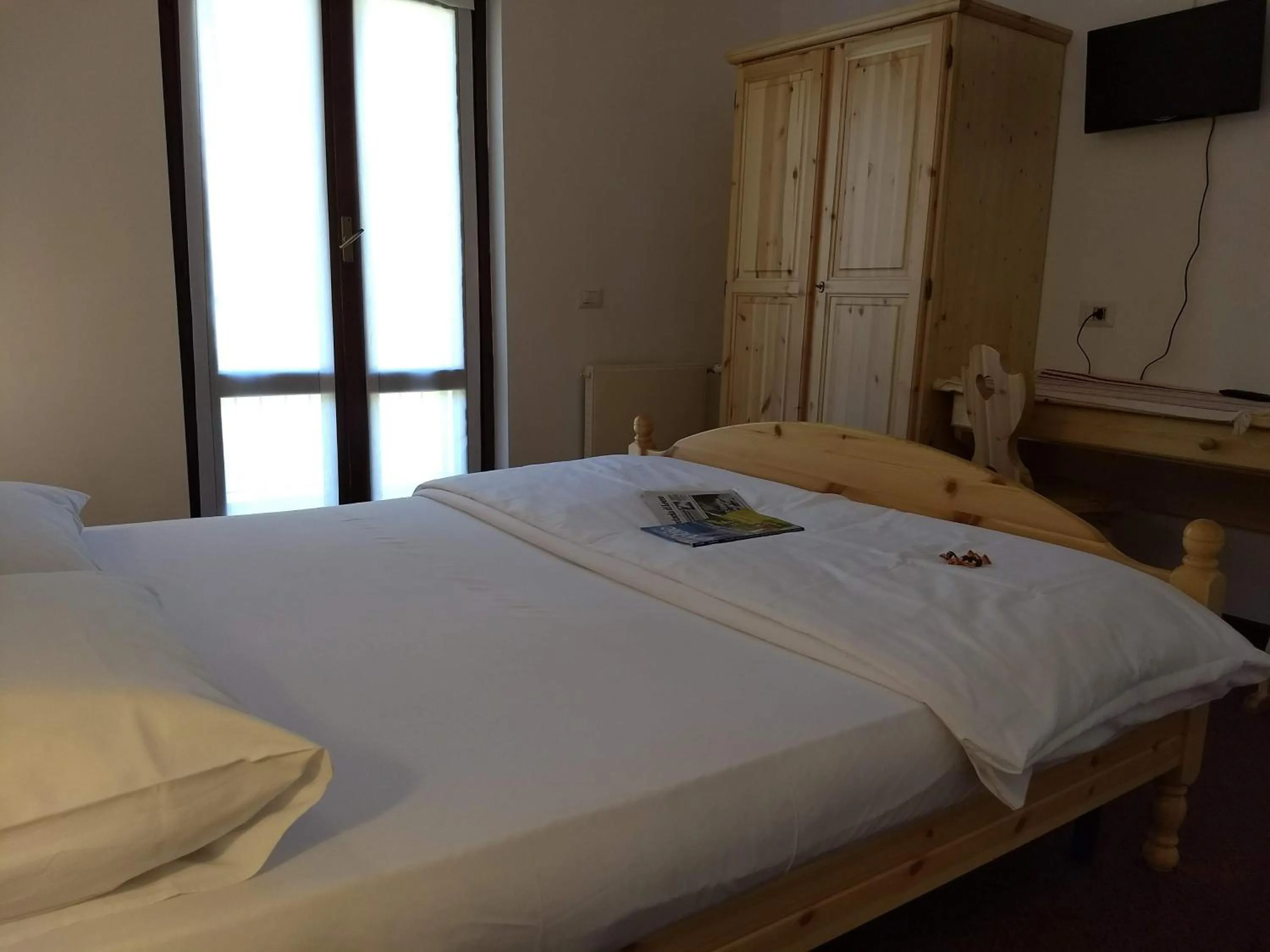 Bed in Hotel Ristorante Sassi Rossi