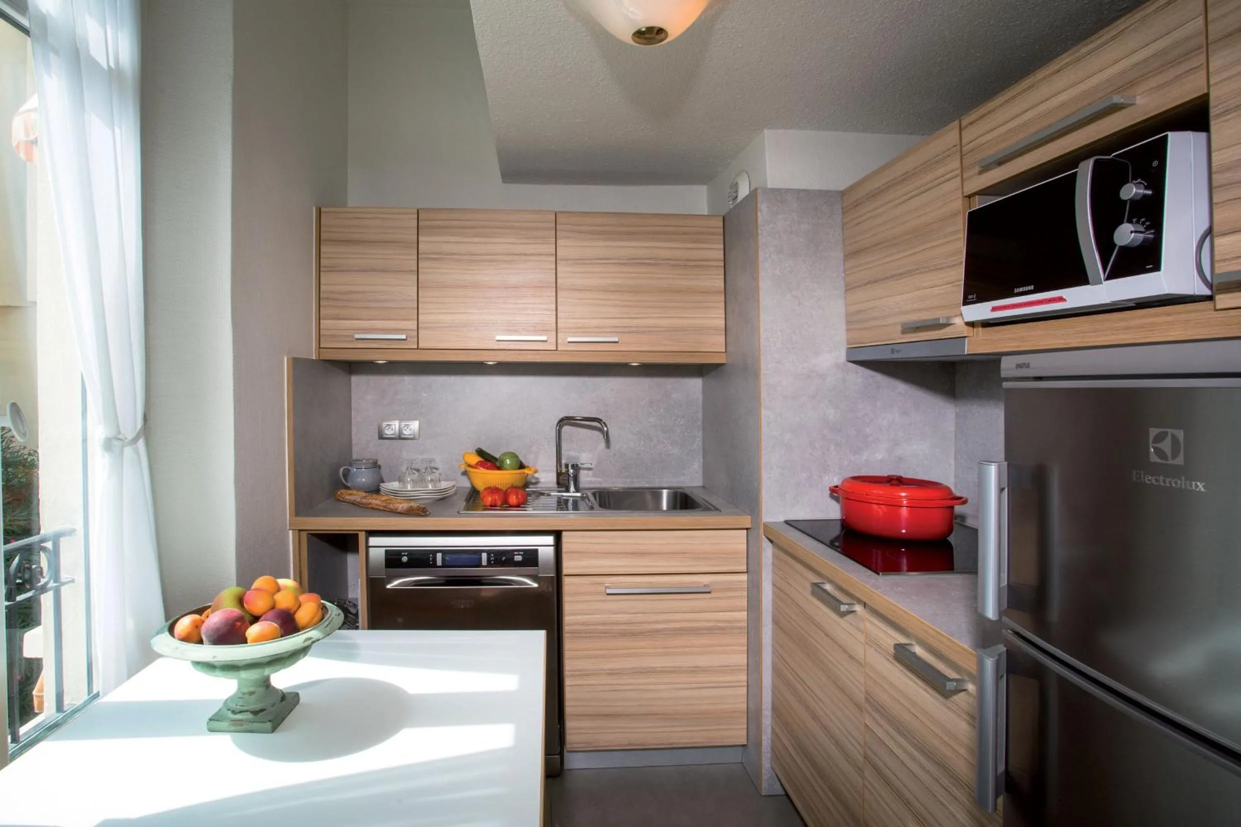 Kitchen or kitchenette in Residence Vacances Bleues le Mediterranée