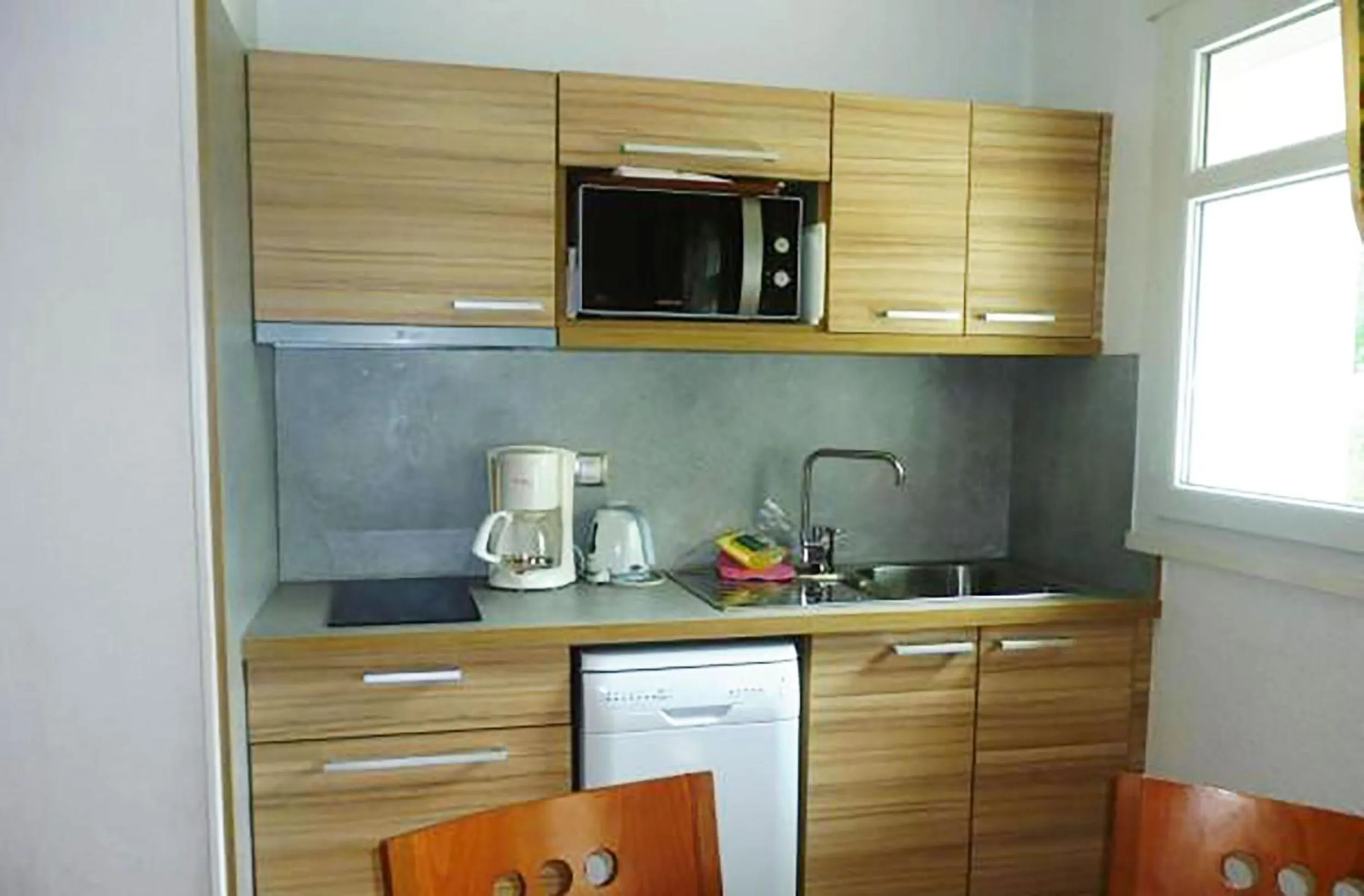 Kitchen or kitchenette in Residence Vacances Bleues le Mediterranée