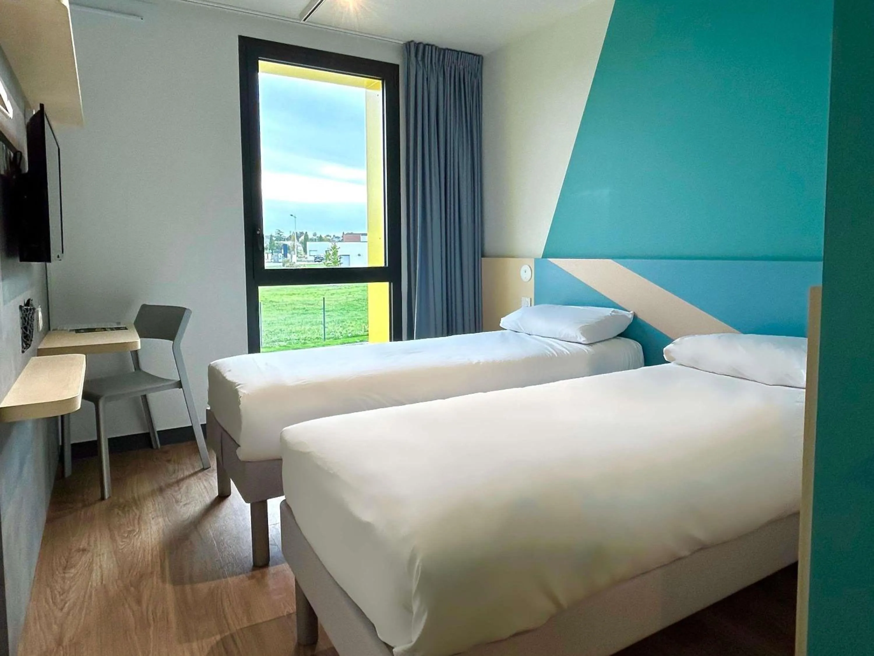 Bedroom, Bed in ibis budget Loudéac Vélodrome