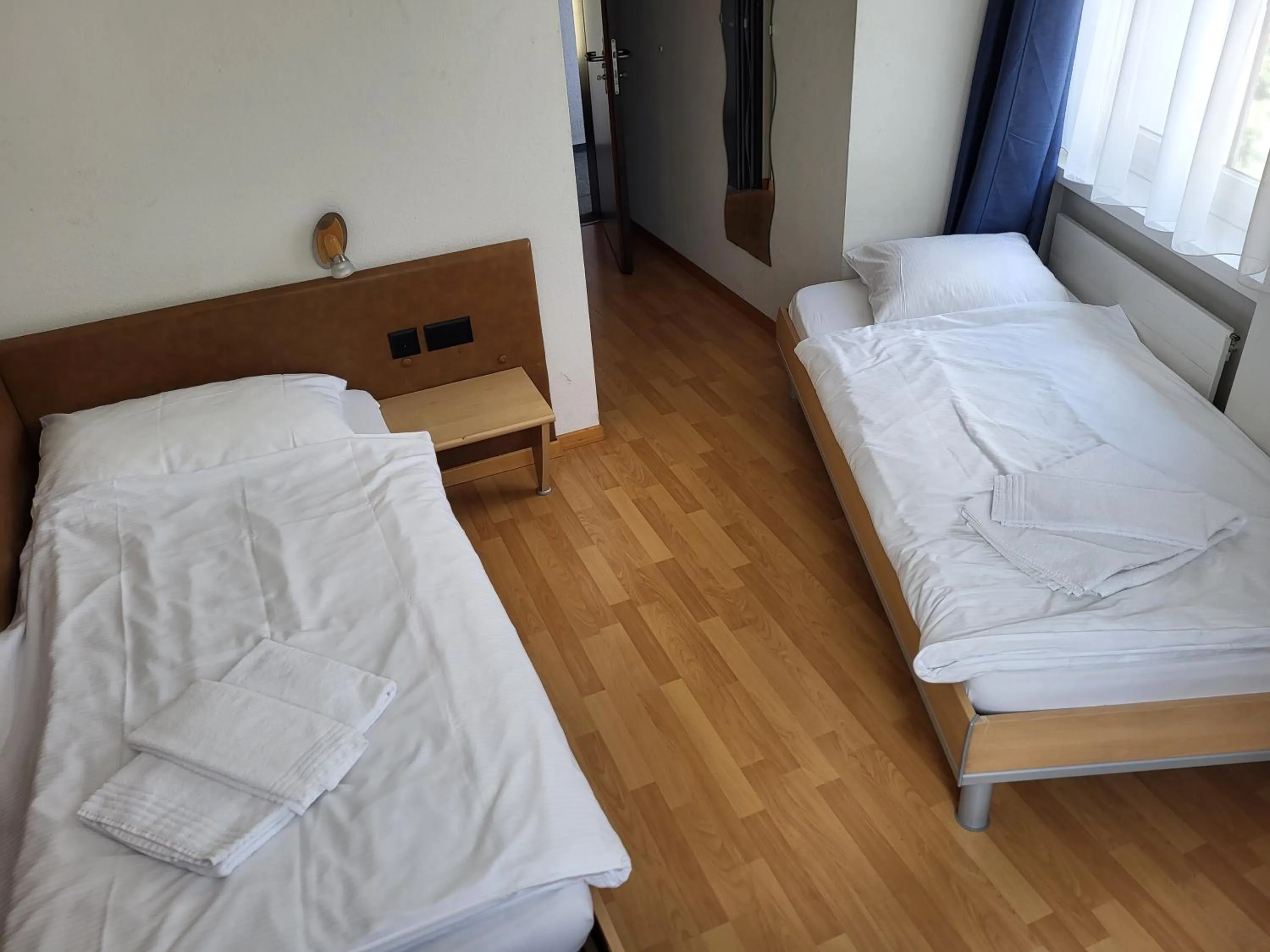 Bedroom, Bed in Hotel Stadthof Glarus