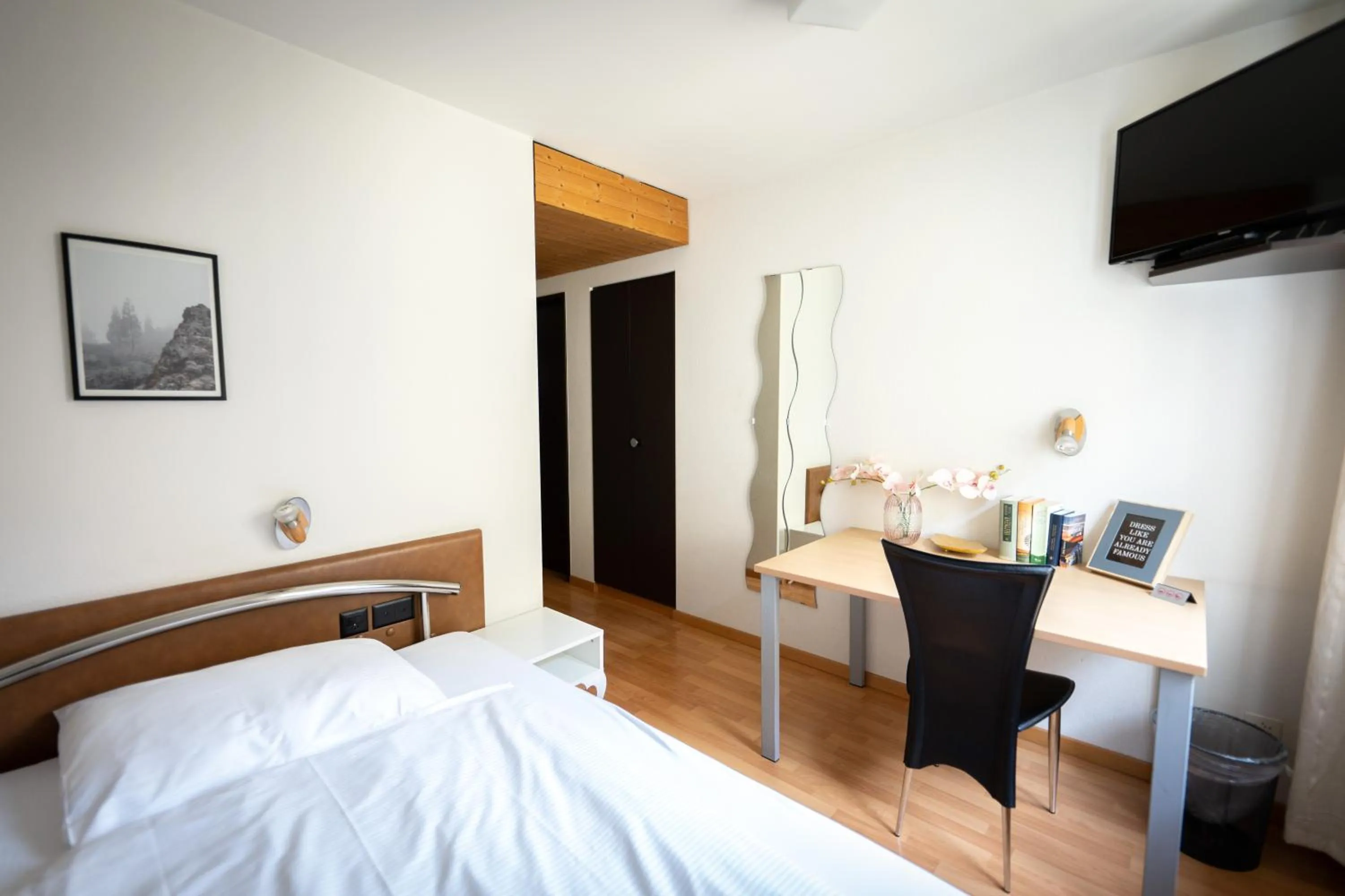 Bedroom, Bed in Hotel Stadthof Glarus