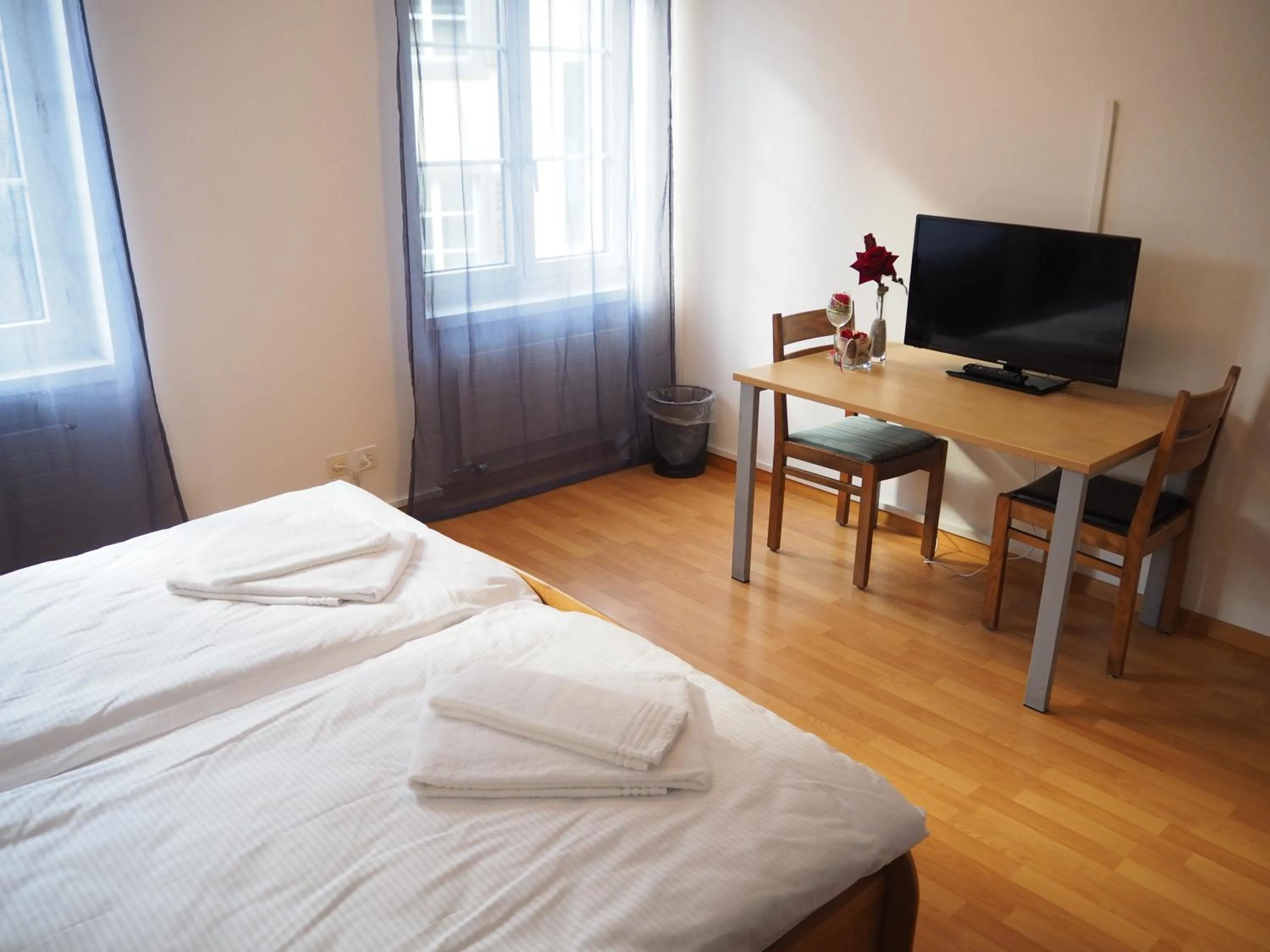 Bed in Hotel Stadthof Glarus