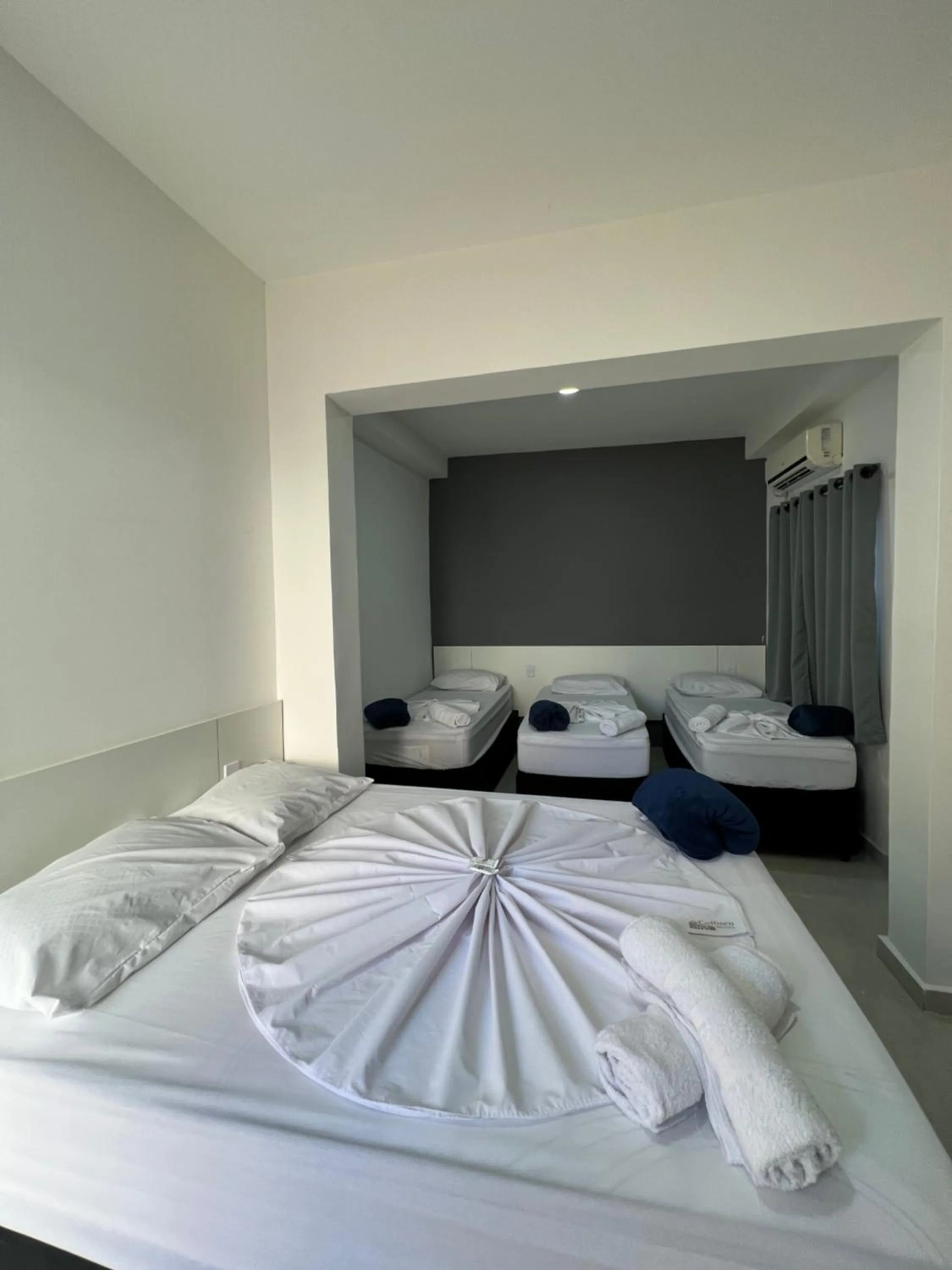 Bed in Hotel Pousada Colliseu