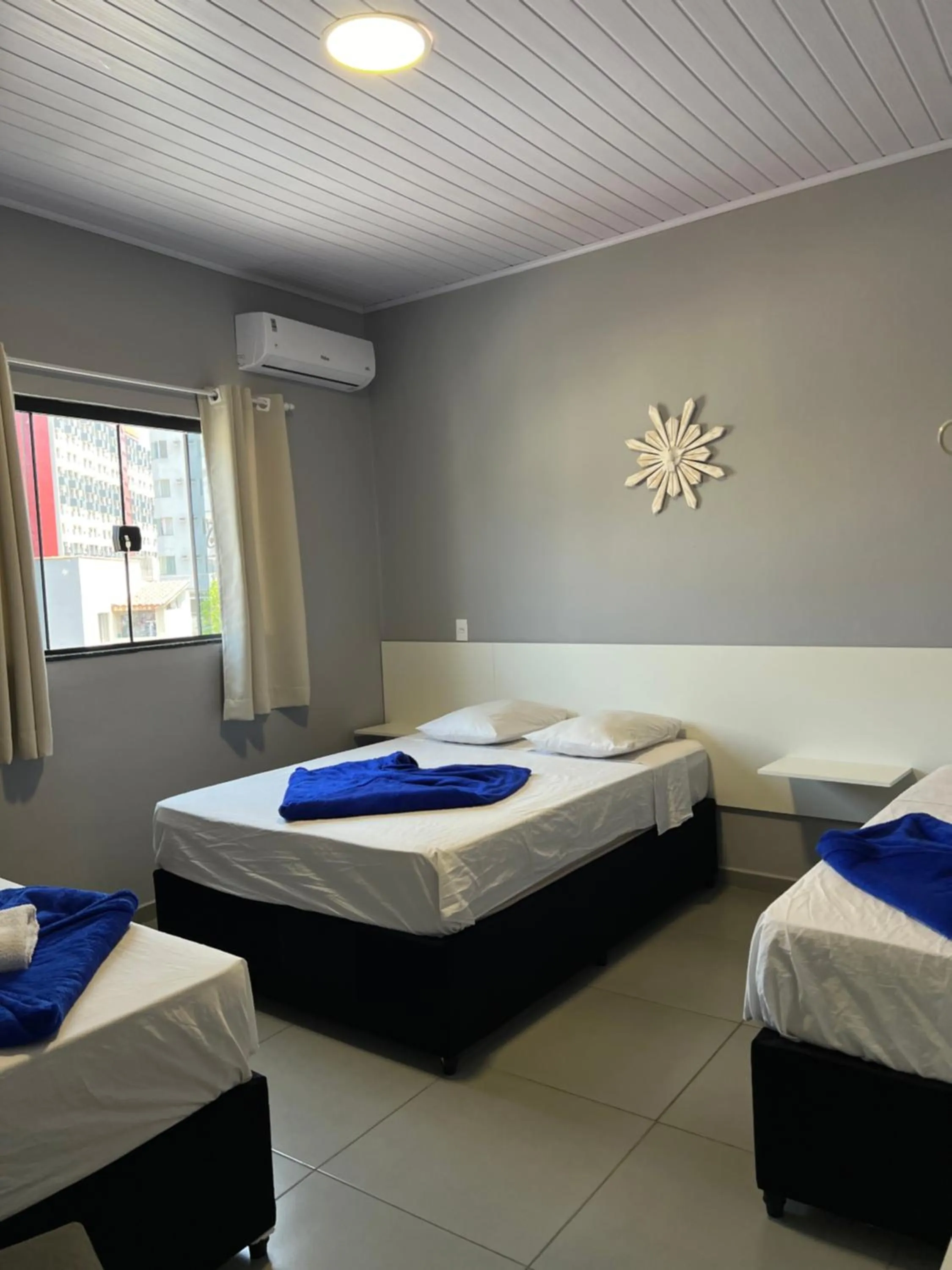 Bed in Hotel Pousada Colliseu