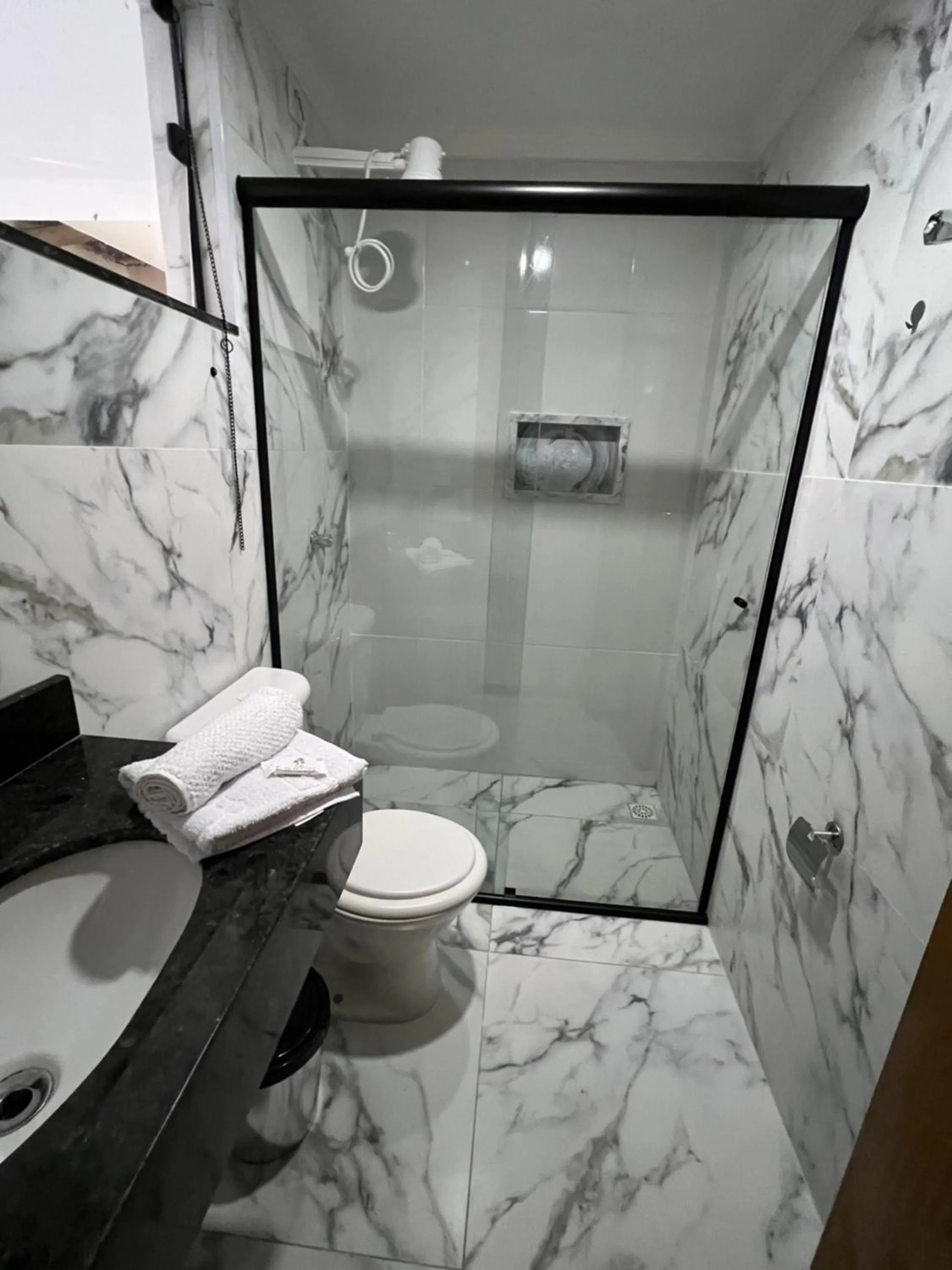 Bathroom in Hotel Pousada Colliseu