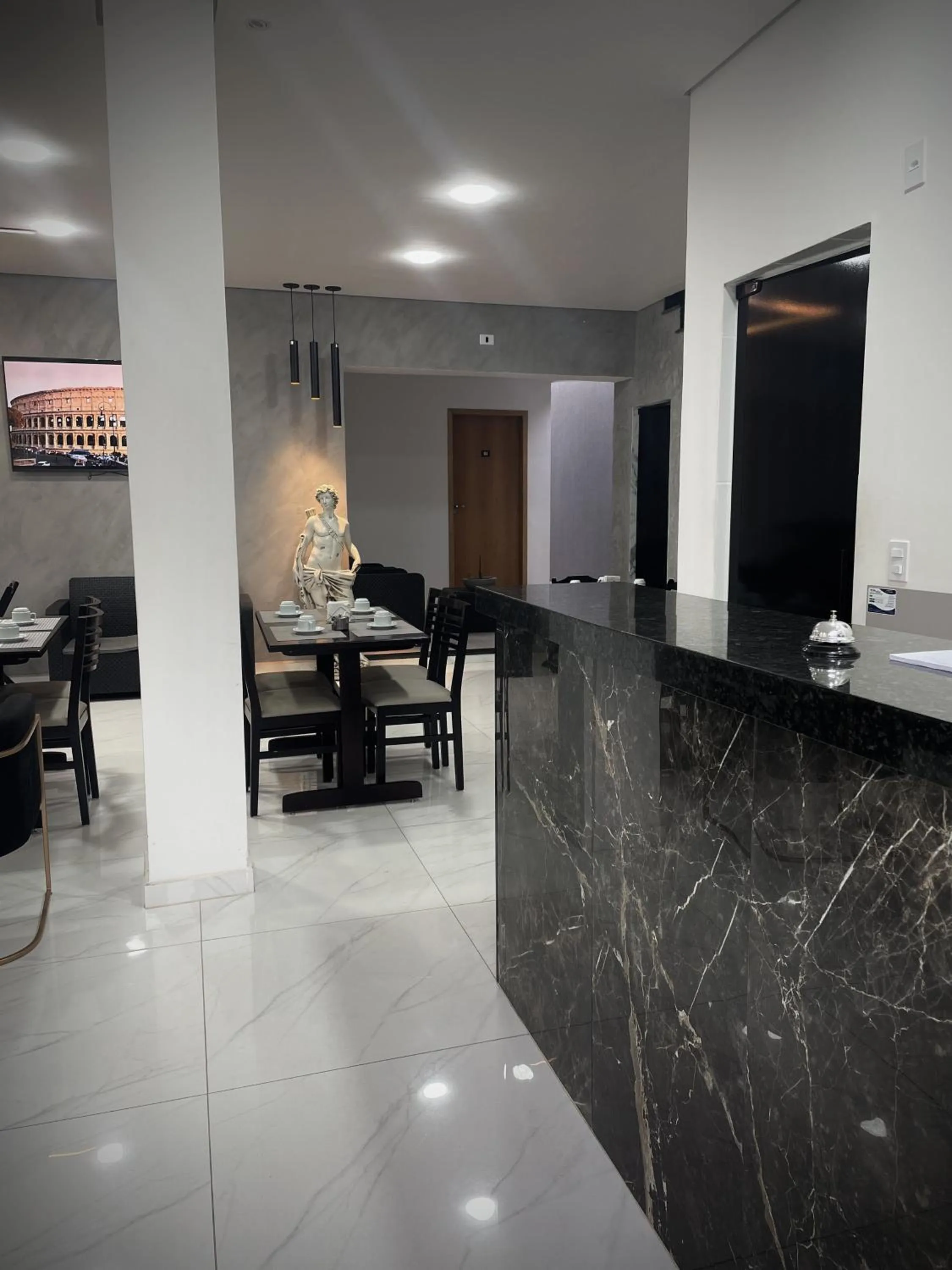 Seating area in Hotel Pousada Colliseu