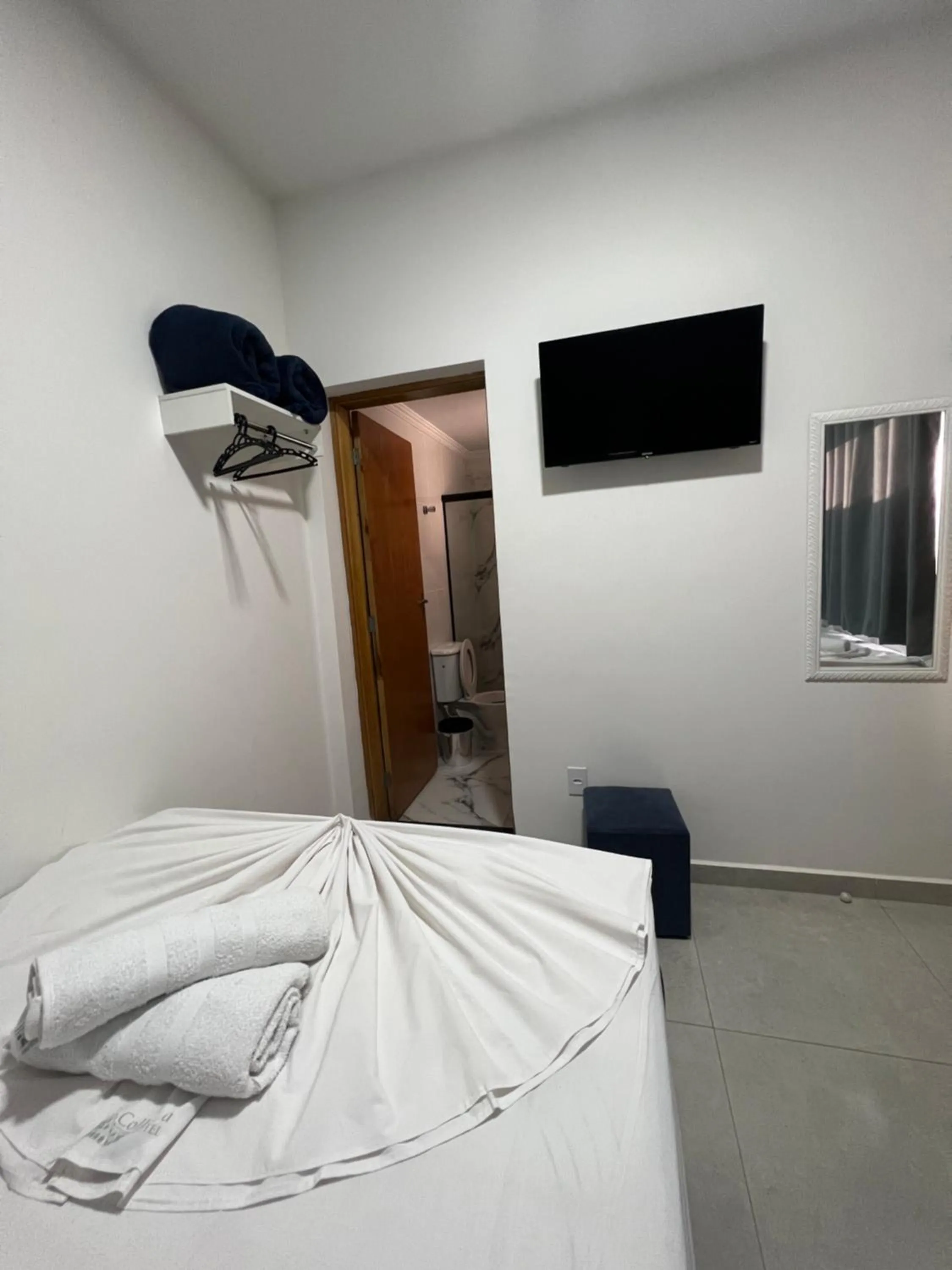 Bed in Hotel Pousada Colliseu