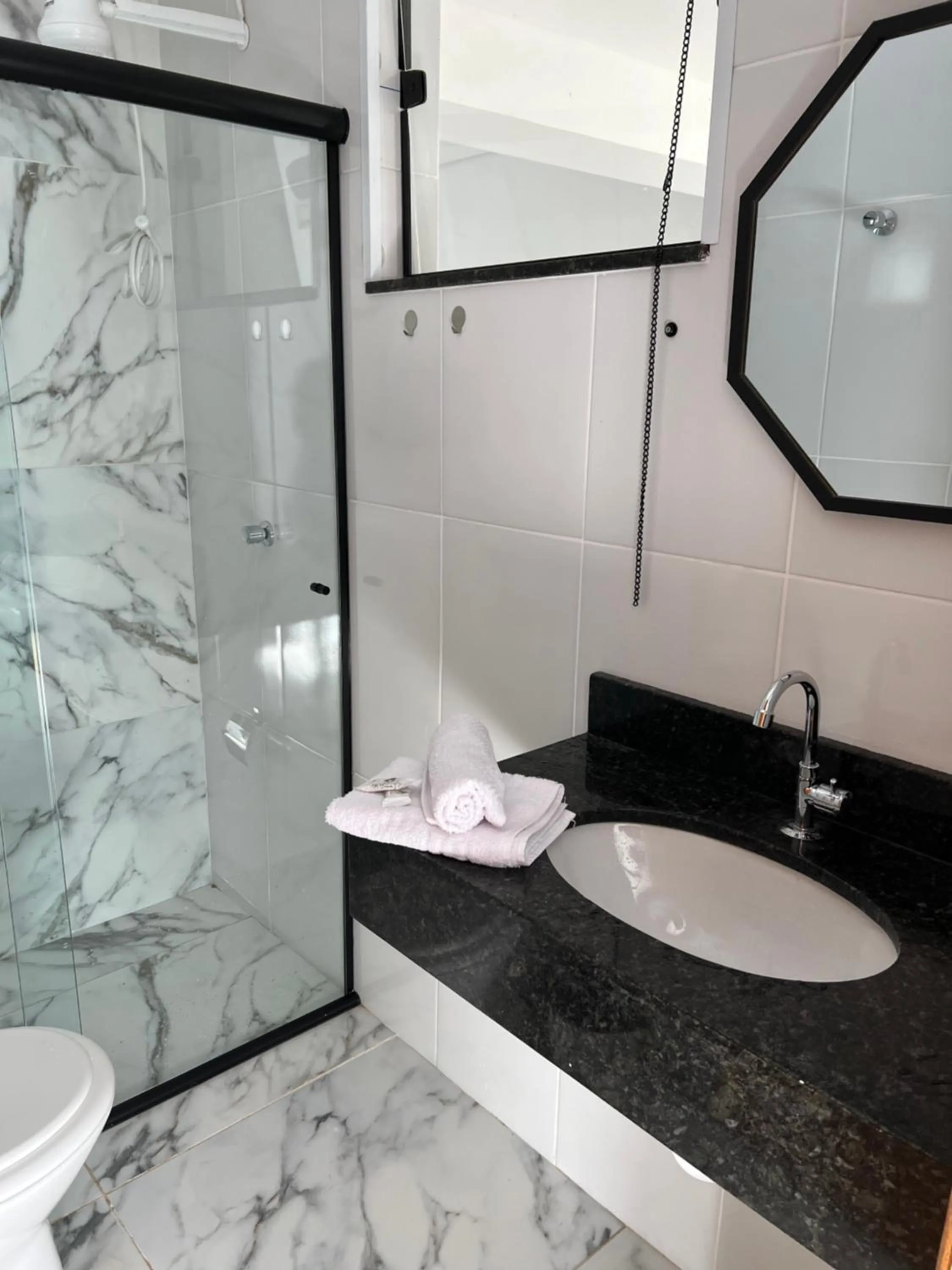 Bathroom in Hotel Pousada Colliseu