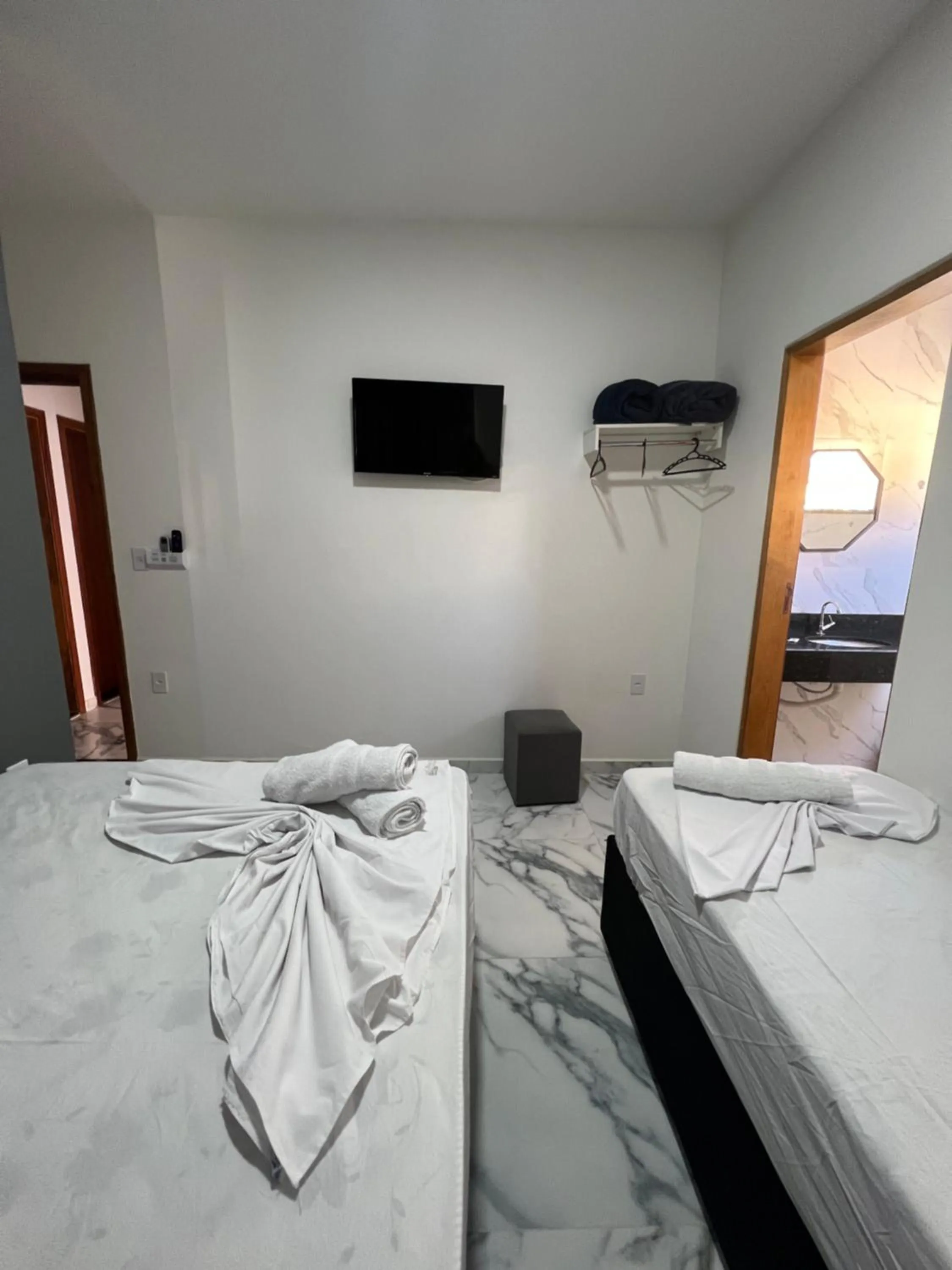 Bed in Hotel Pousada Colliseu