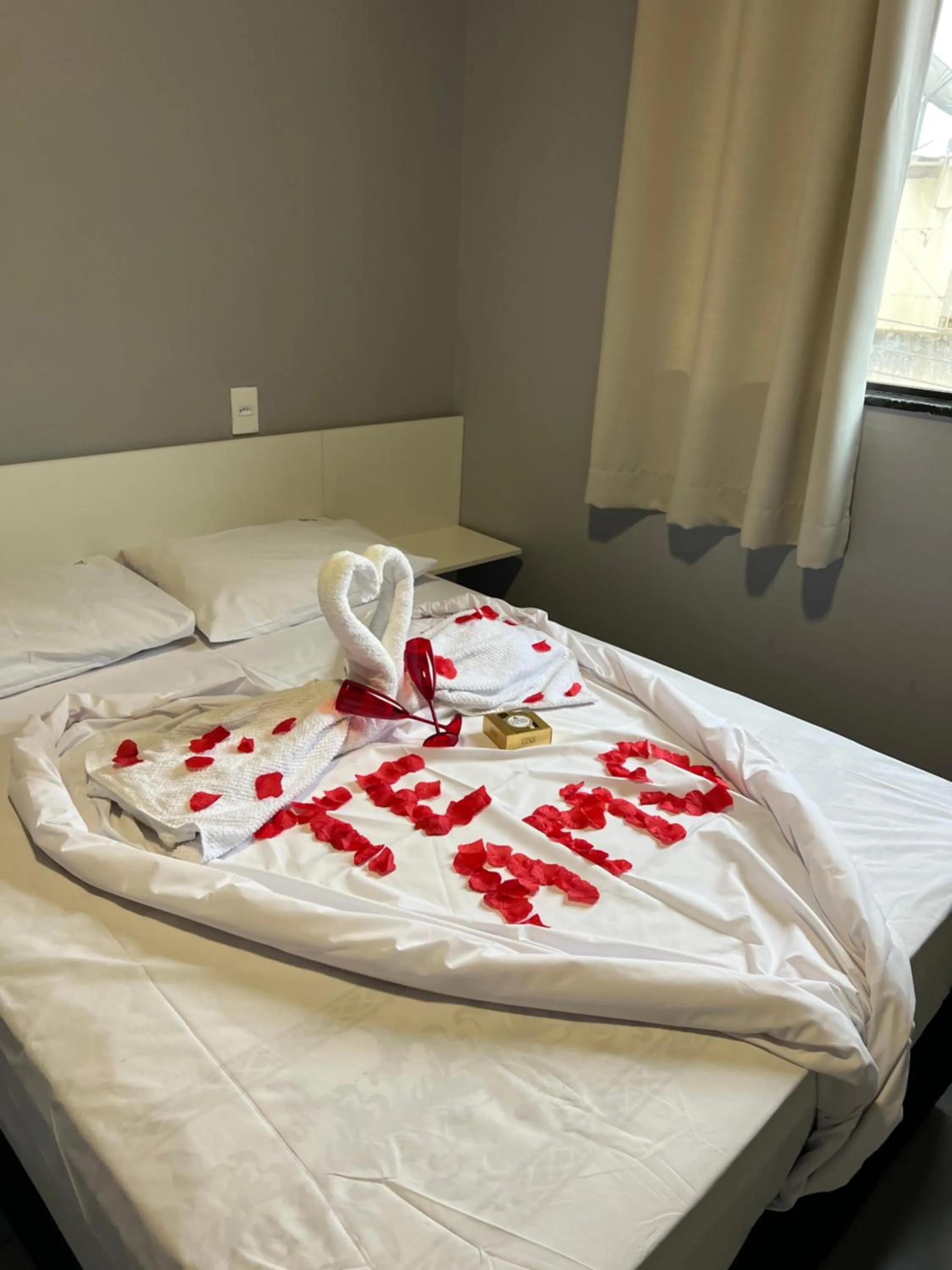 Bed in Hotel Pousada Colliseu