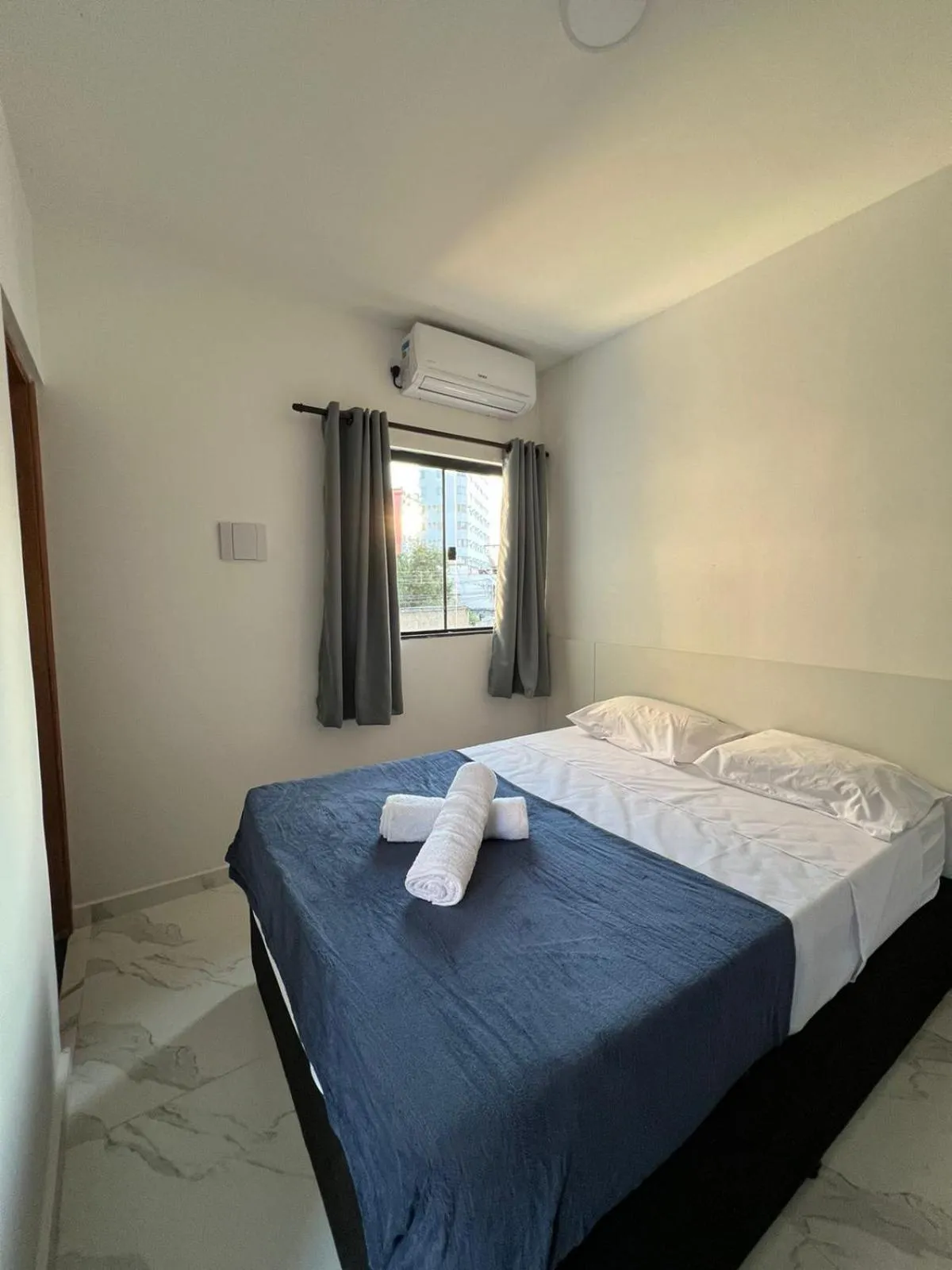 Bed in Hotel Pousada Colliseu