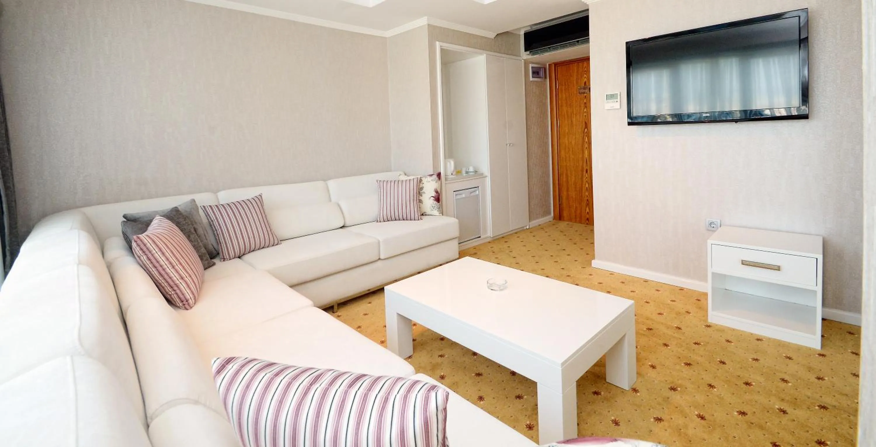 Living room, Bed in NK Hotel