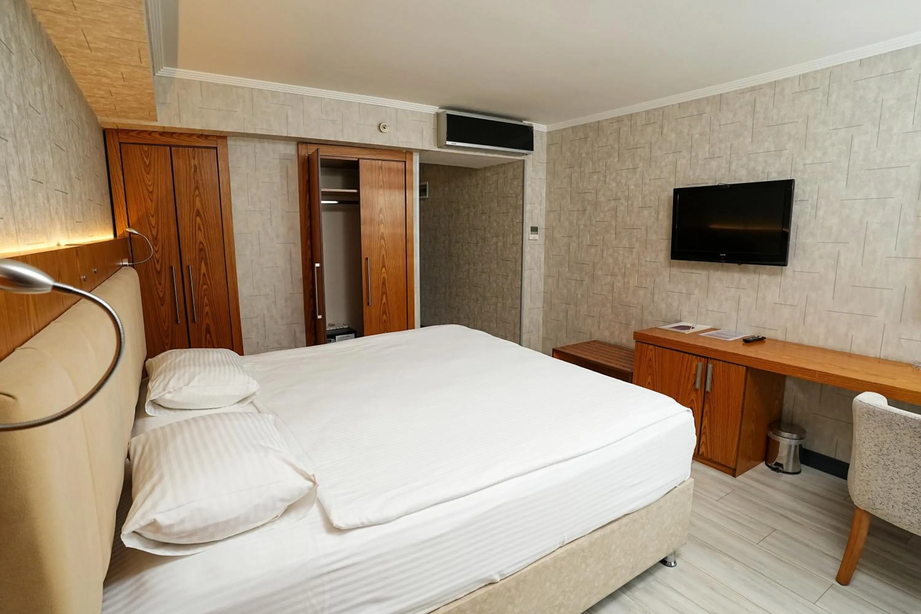 Photo of the whole room, Bed in NK Hotel