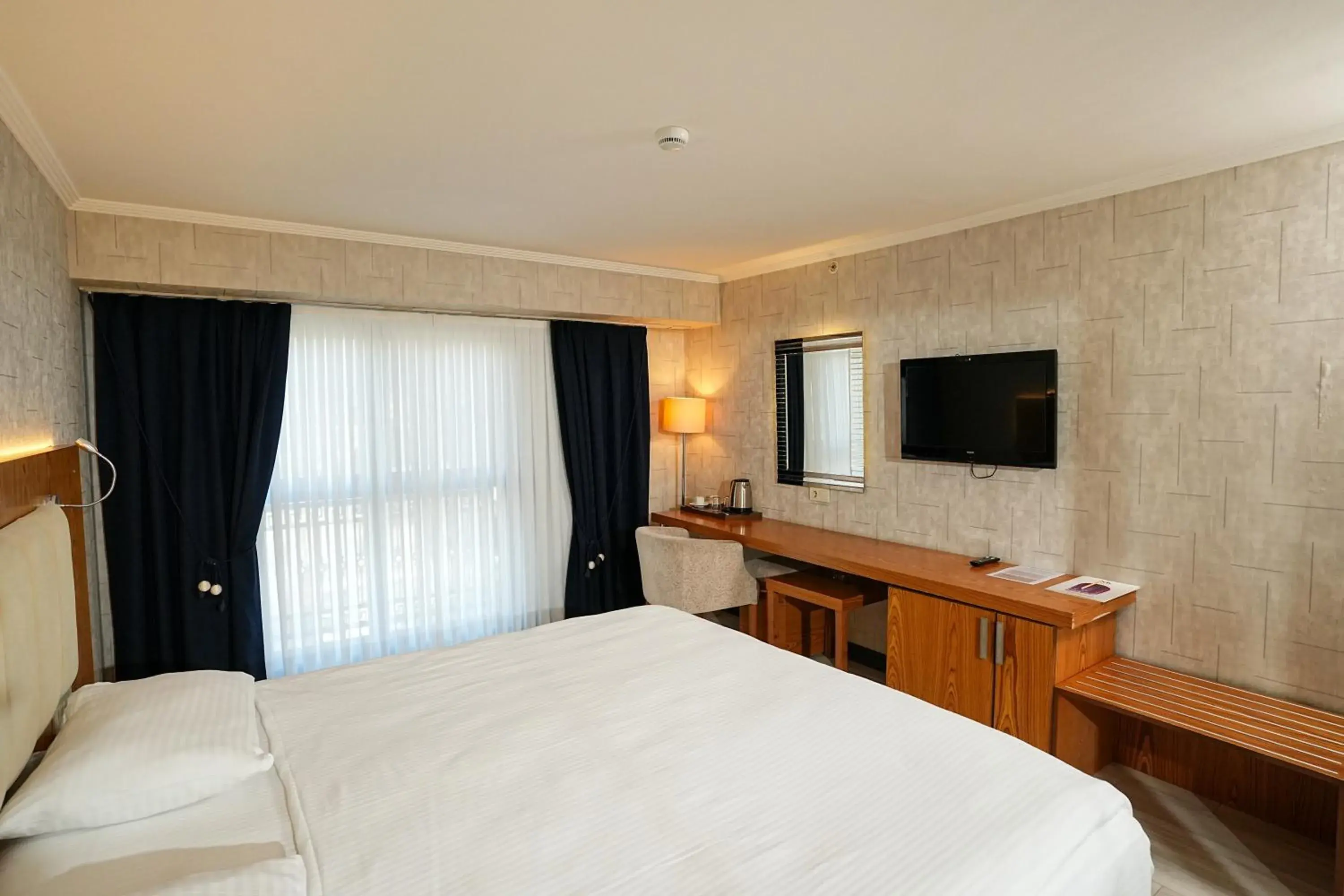 Photo of the whole room, Bed in NK Hotel Photo of the whole room, Bed in NK Hotel